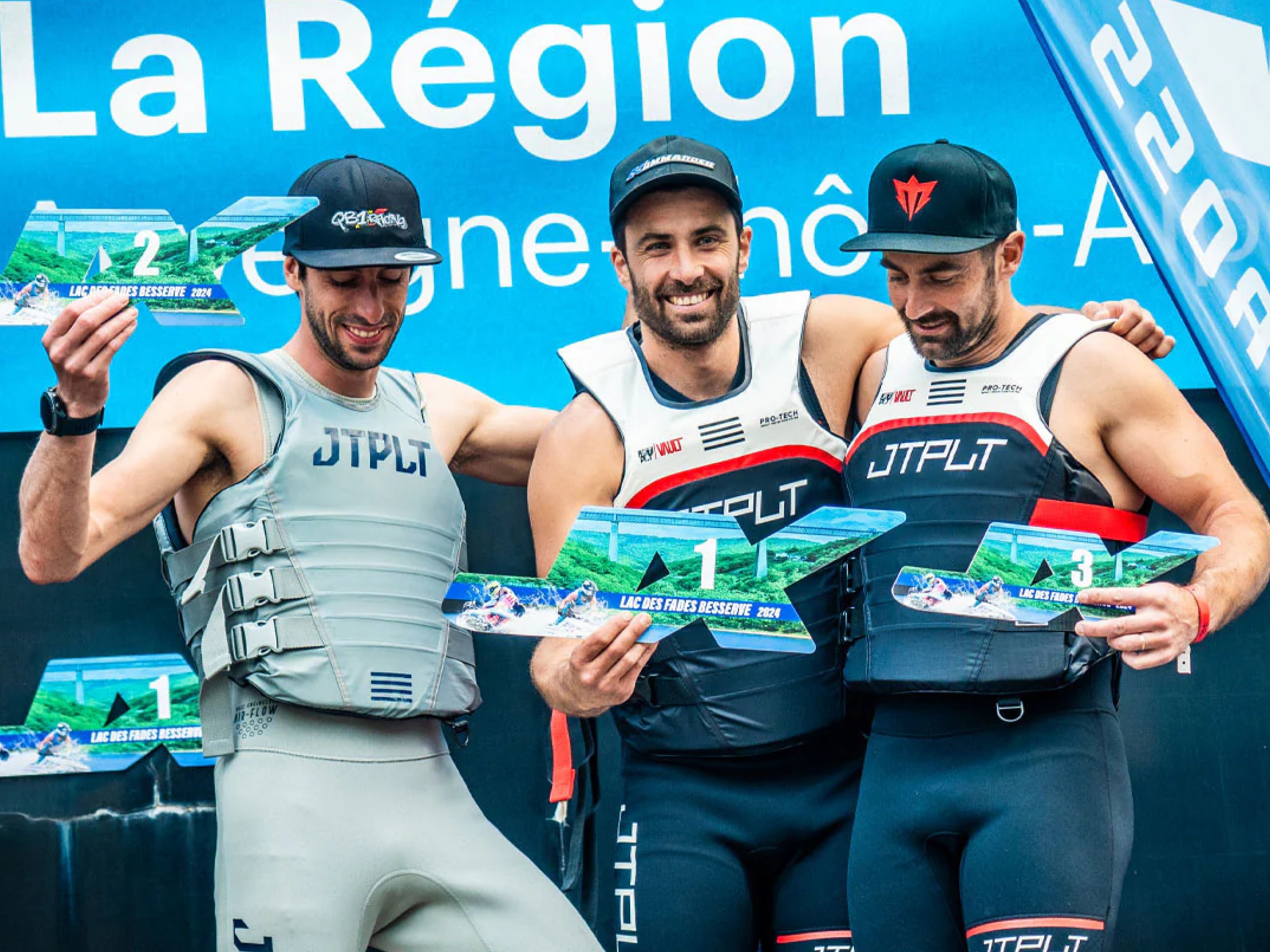 Jetcross Pro Tour riders in Jetpilot JTPLT gear celebrating a 1-2-3 podium finish