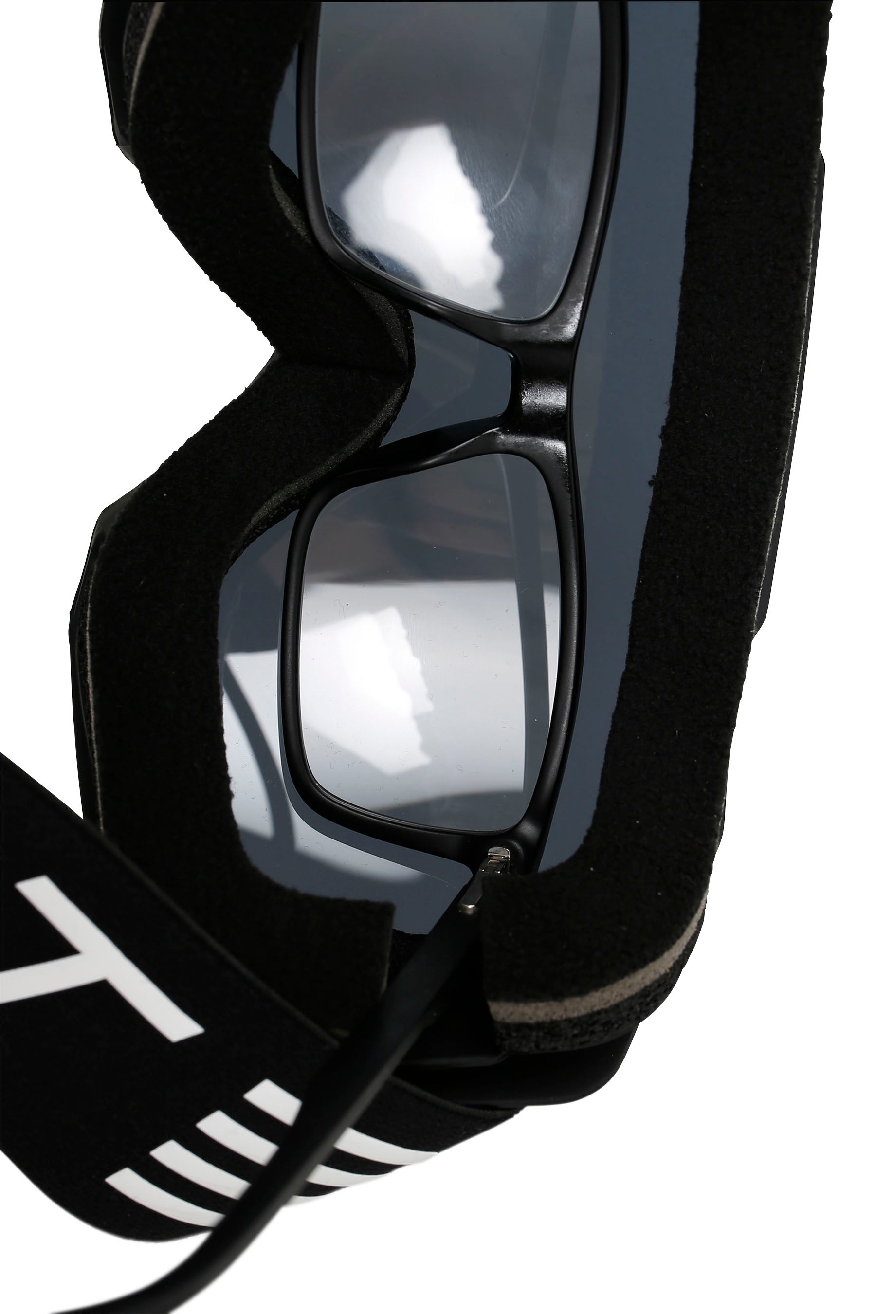 Black goggles with a strap on a white background