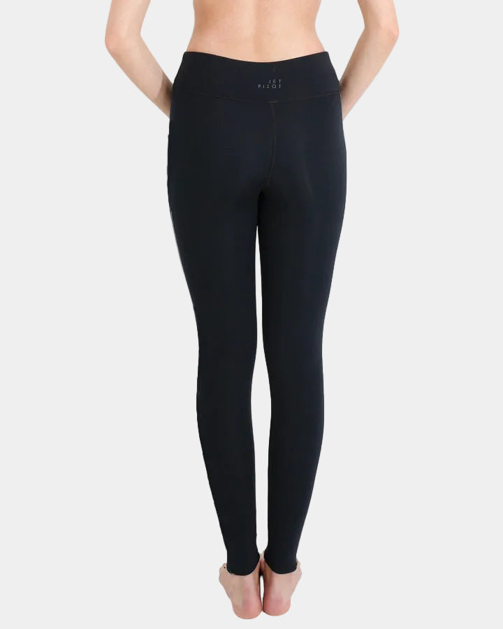 Back view of the Black X1 leggings with the small Jetpilot logo on the waistband