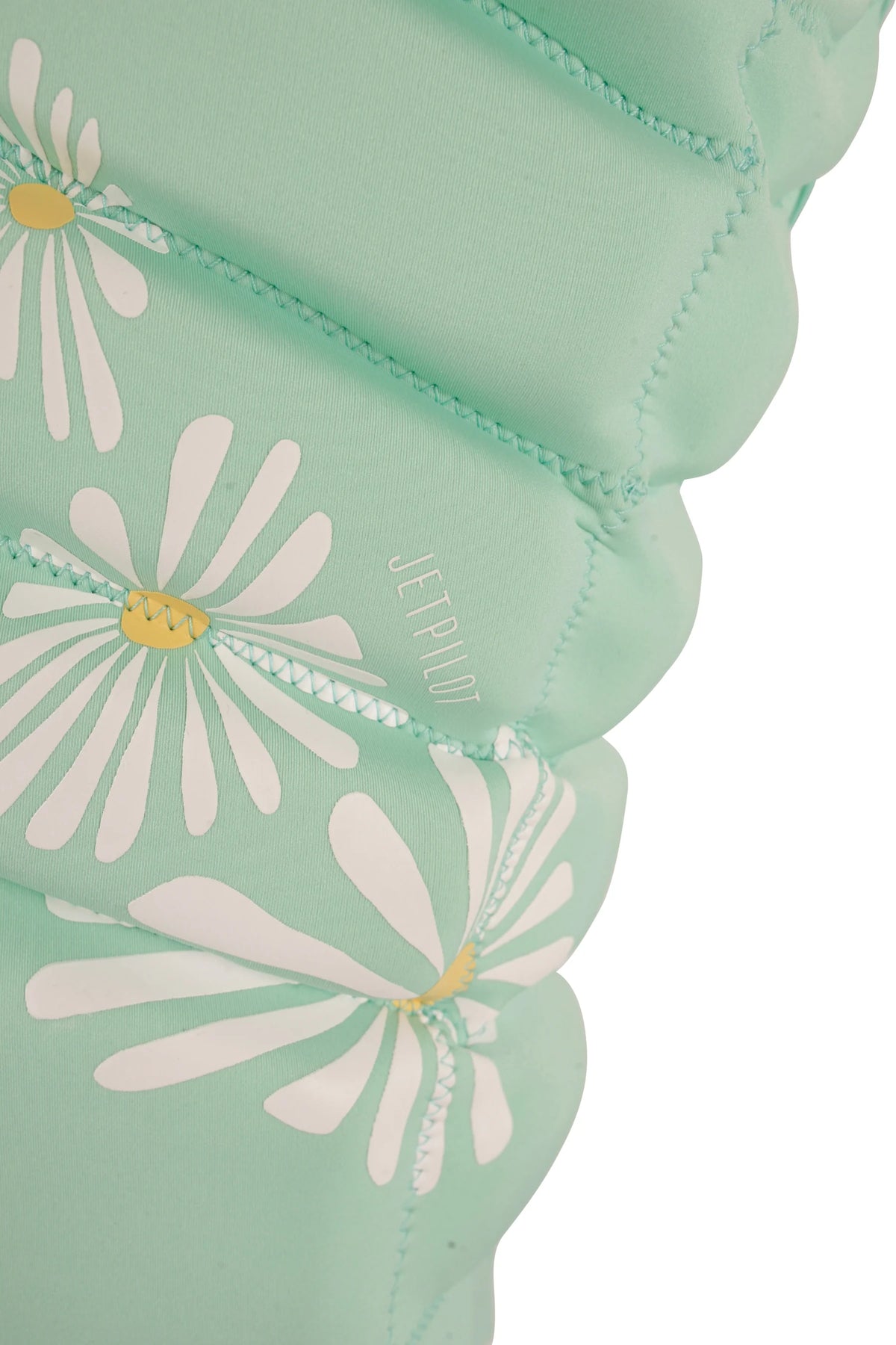 Daisies and a small vertical Jetpilot logo on the segmented side panels of the Teal Isla