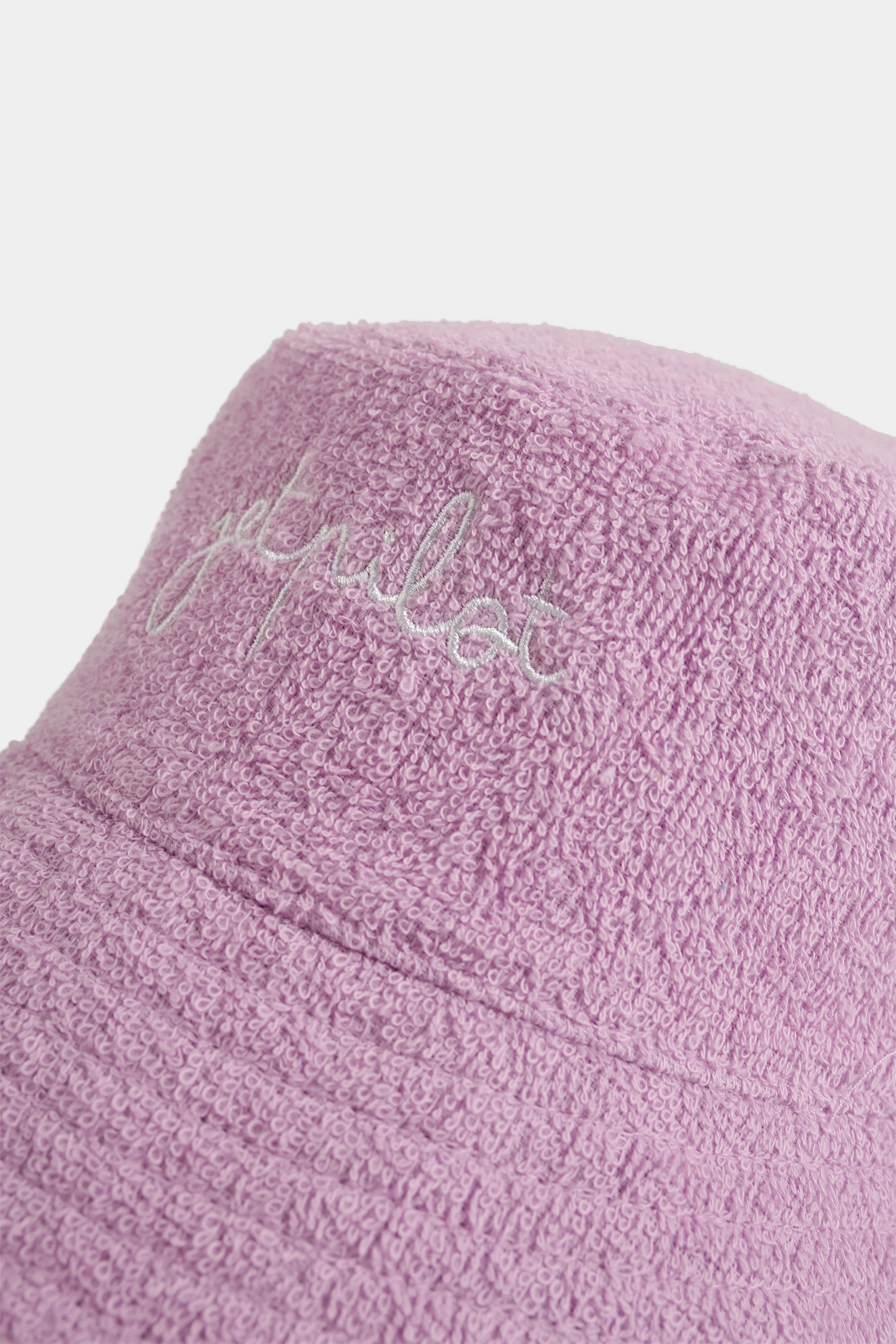 Pink bucket hat with 'Jetpilot' embroidery on a white background