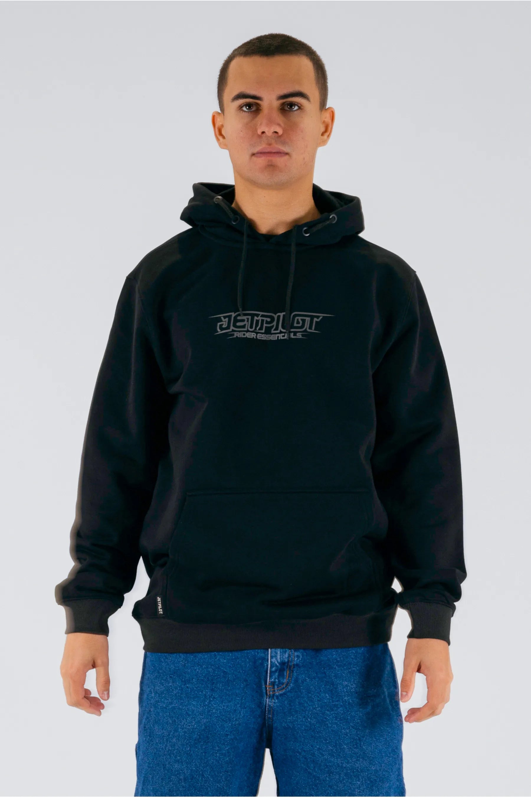 front of a person wearing a black pullover with a Jetpilot logo on a white background — view 1 (3)