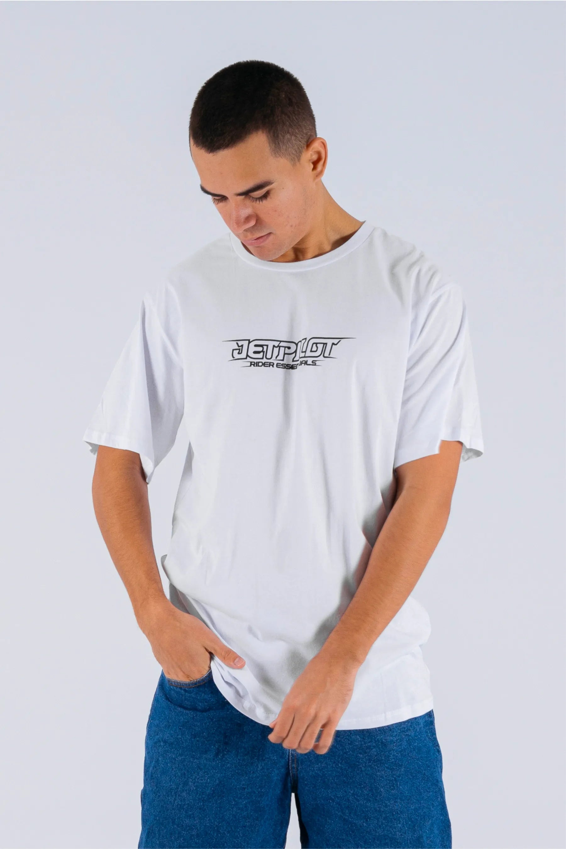 a person wearing a white tee with a Jetpilot logo on a white background — view 3 (4)
