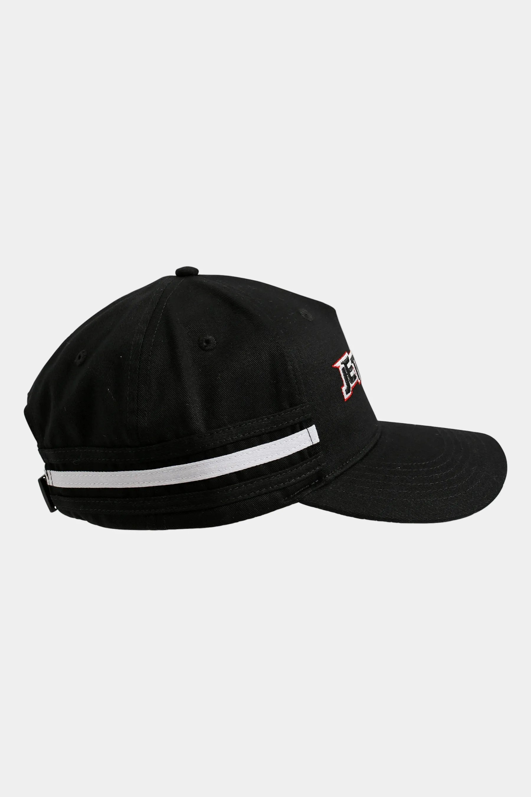 Black cap with white stripe on a light gray background