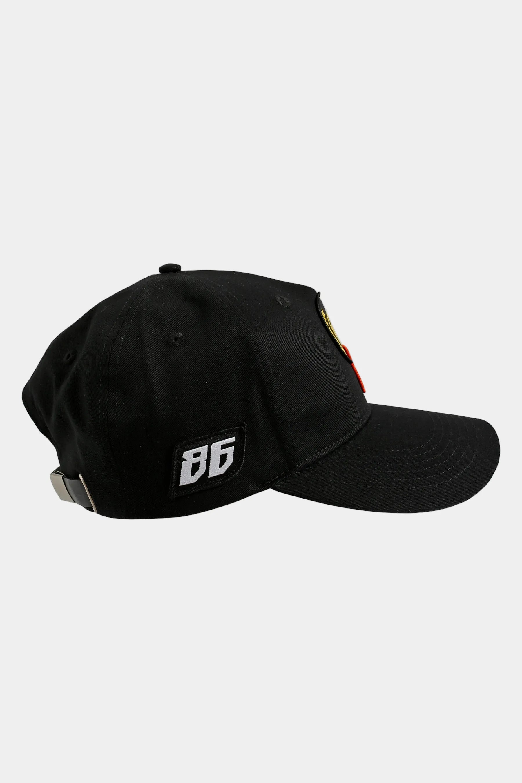 Black cap with a '86' logo on a white background