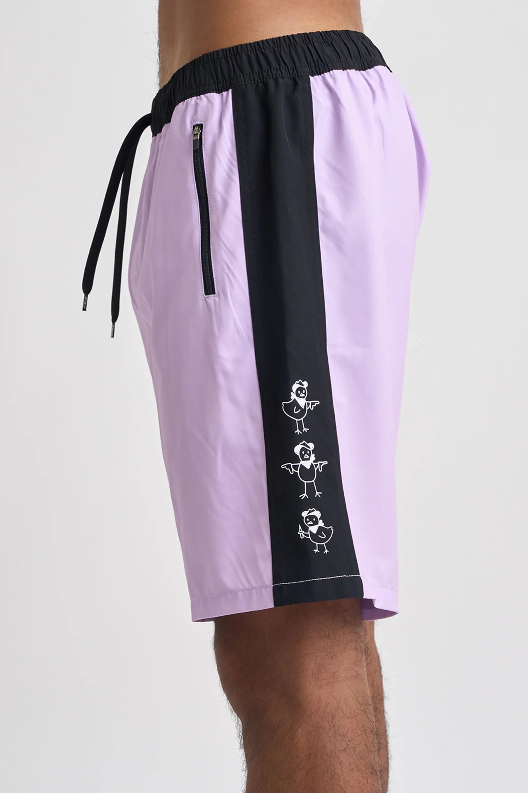 Purple shorts with black side panel and white graphics on a plain background