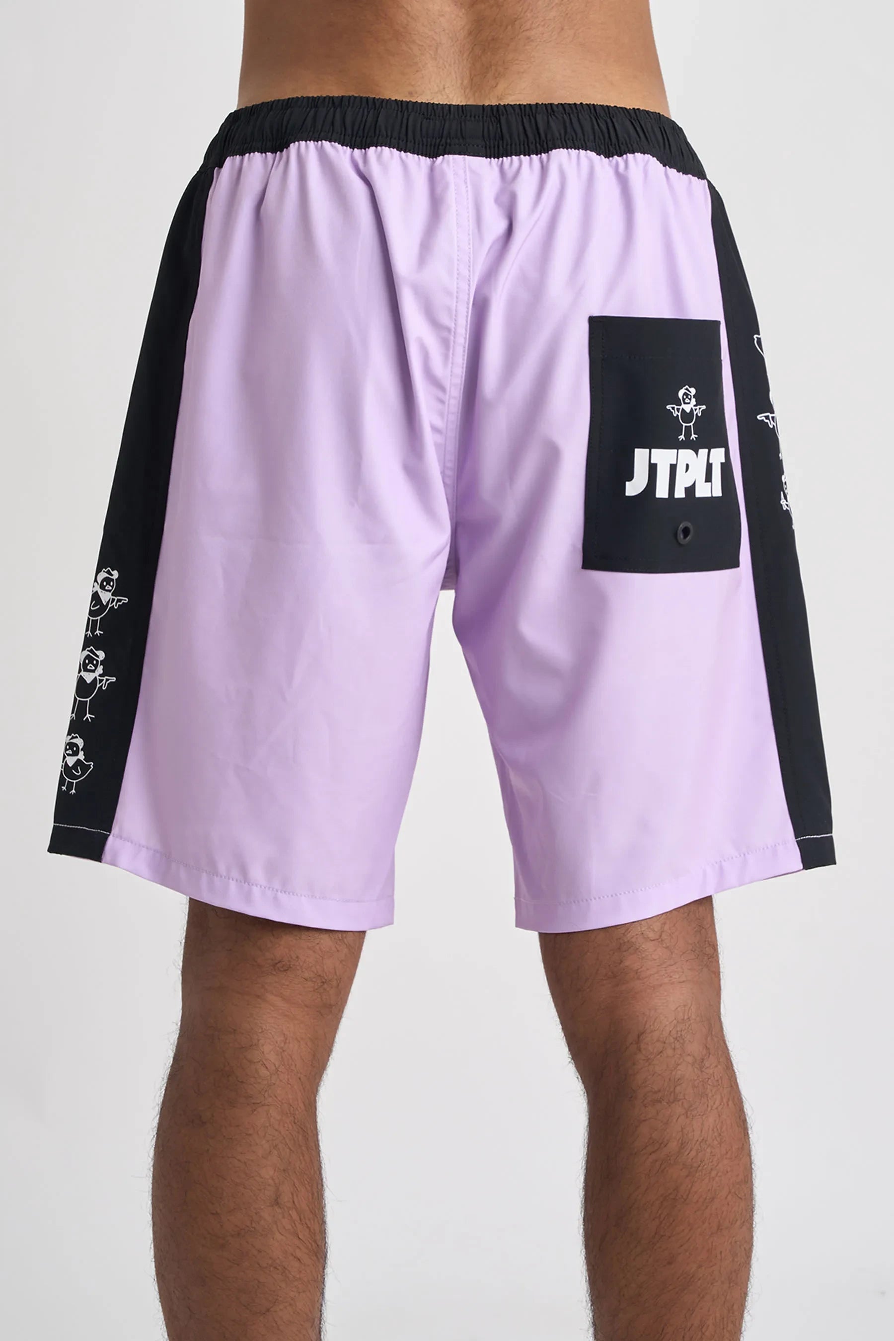 Purple shorts with black accents and a logo on a white background