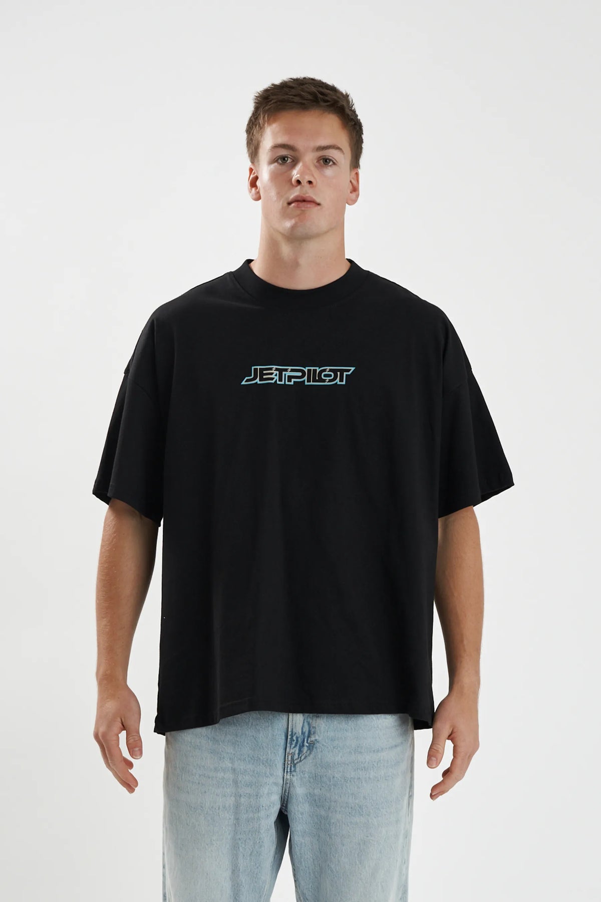 Jetpilot Stocked Up Spinal mens oversized graphic tee in Black — front view on a male model