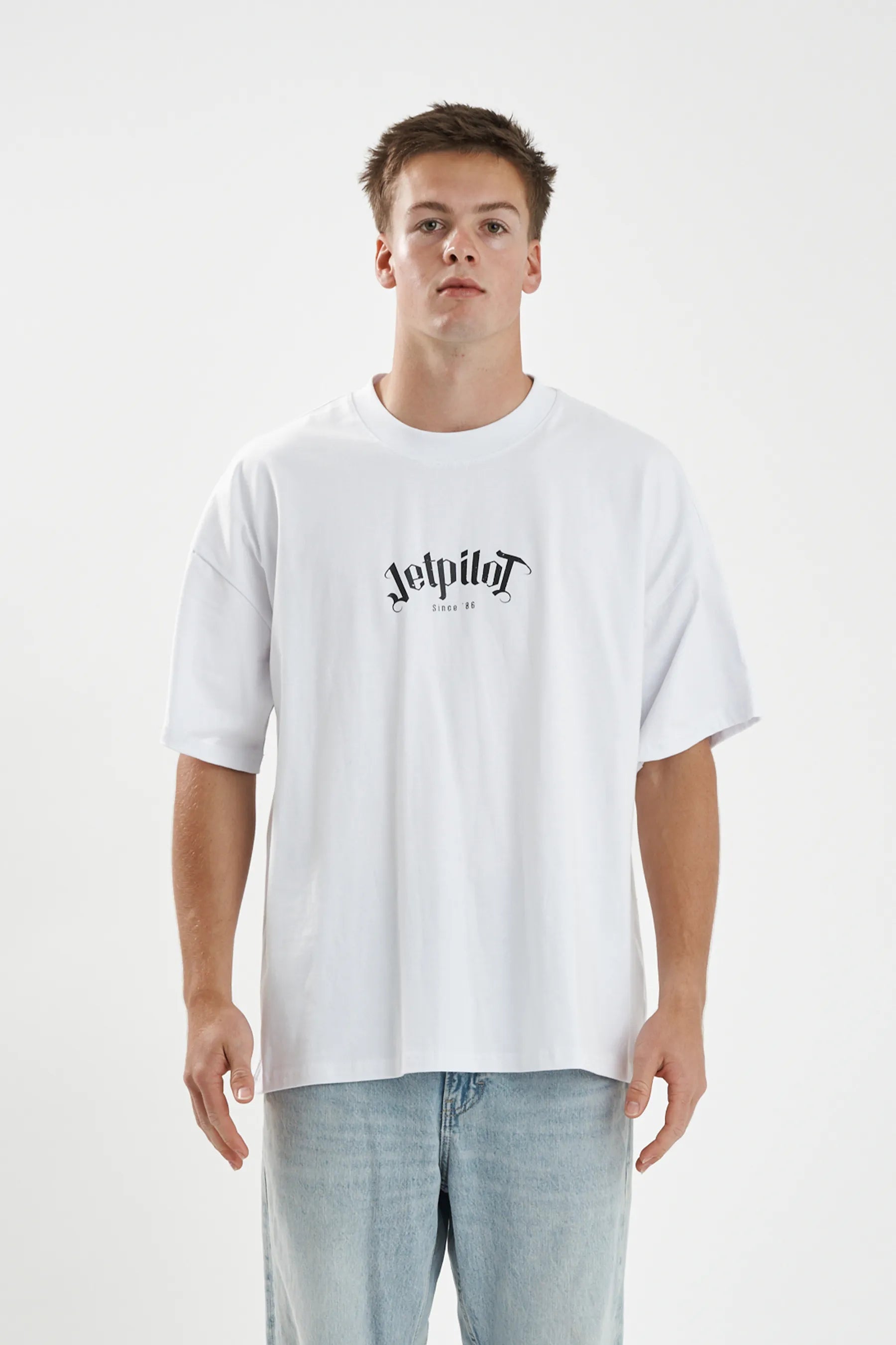 Jetpilot Plastered mens oversized graphic tee in White — front view on a male model