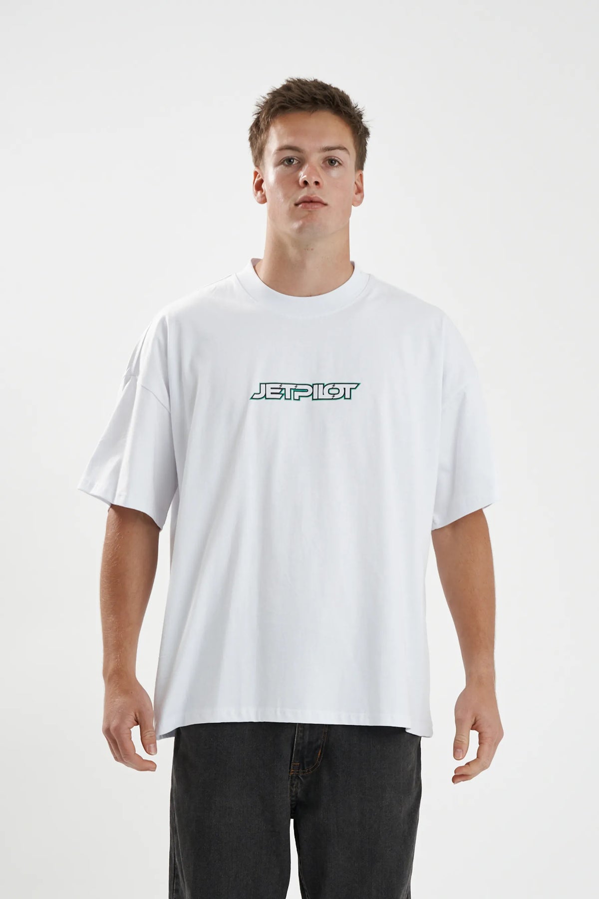 Jetpilot Stocked Up mens oversized graphic tee in White — front view on a male model
