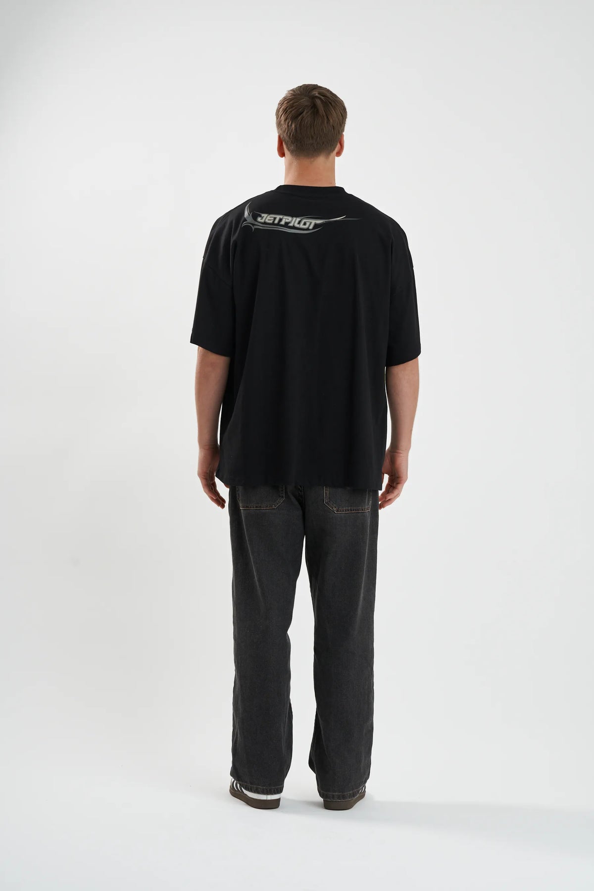 Back of the black Jetpilot Sinister Tee with the grey back-neck print