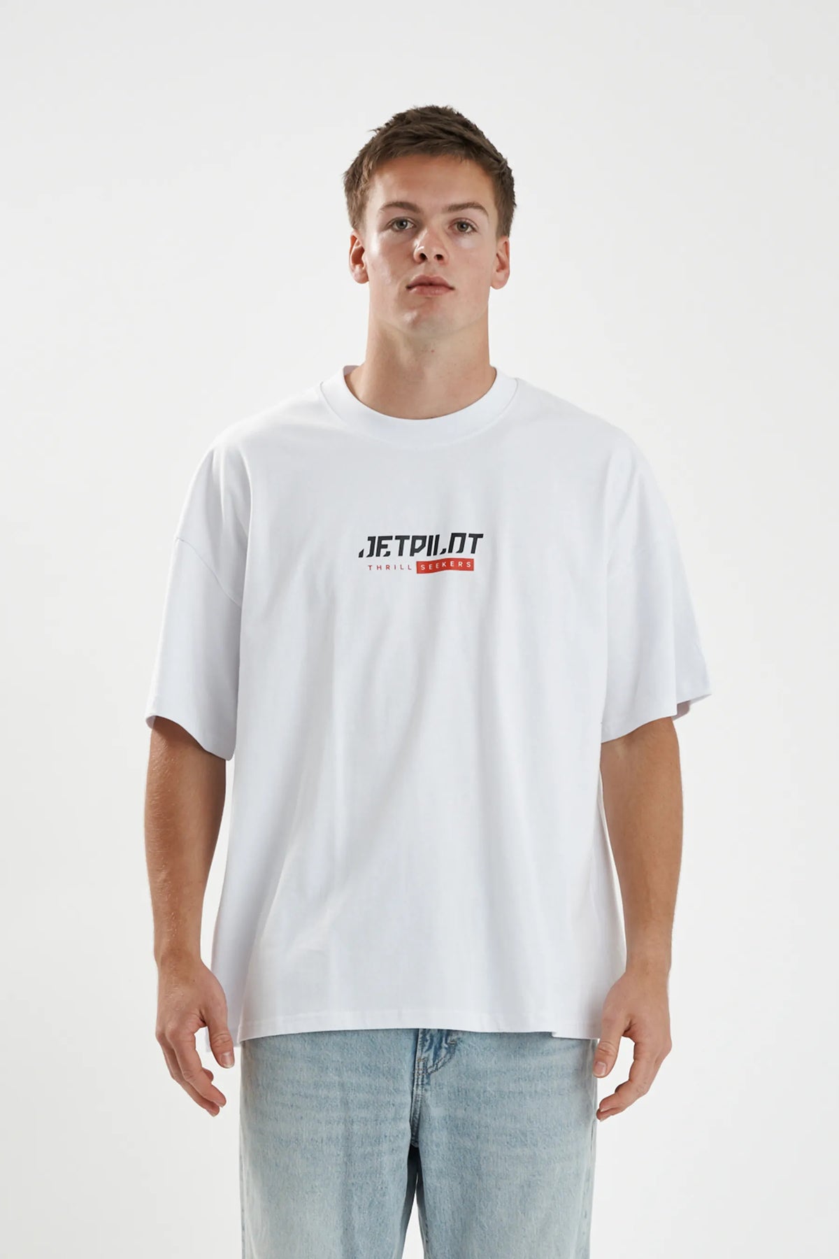Jetpilot 86 Worldwide mens oversized graphic tee in White — front view on a male model