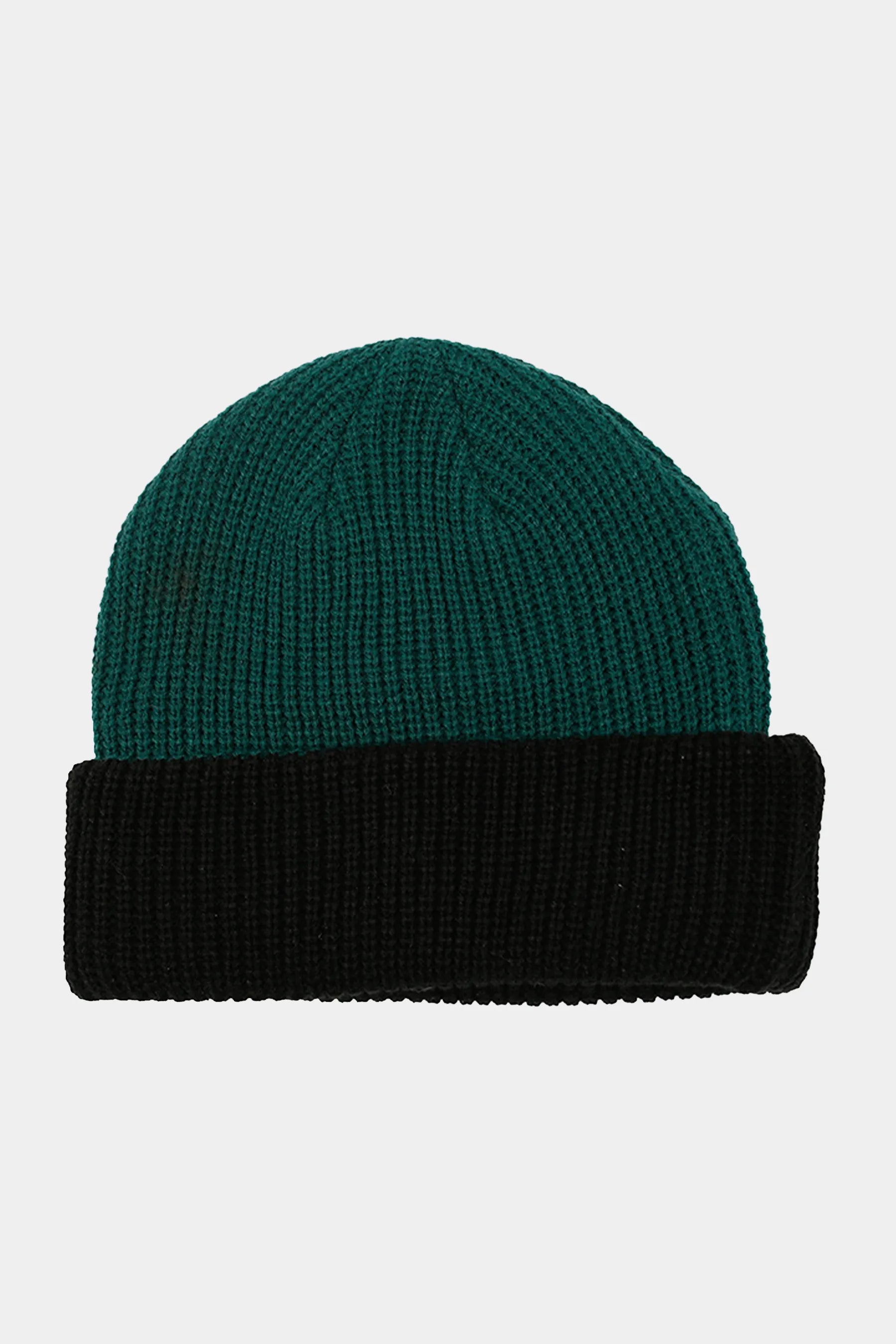 Two-tone green and black beanie on a light gray background — image 2