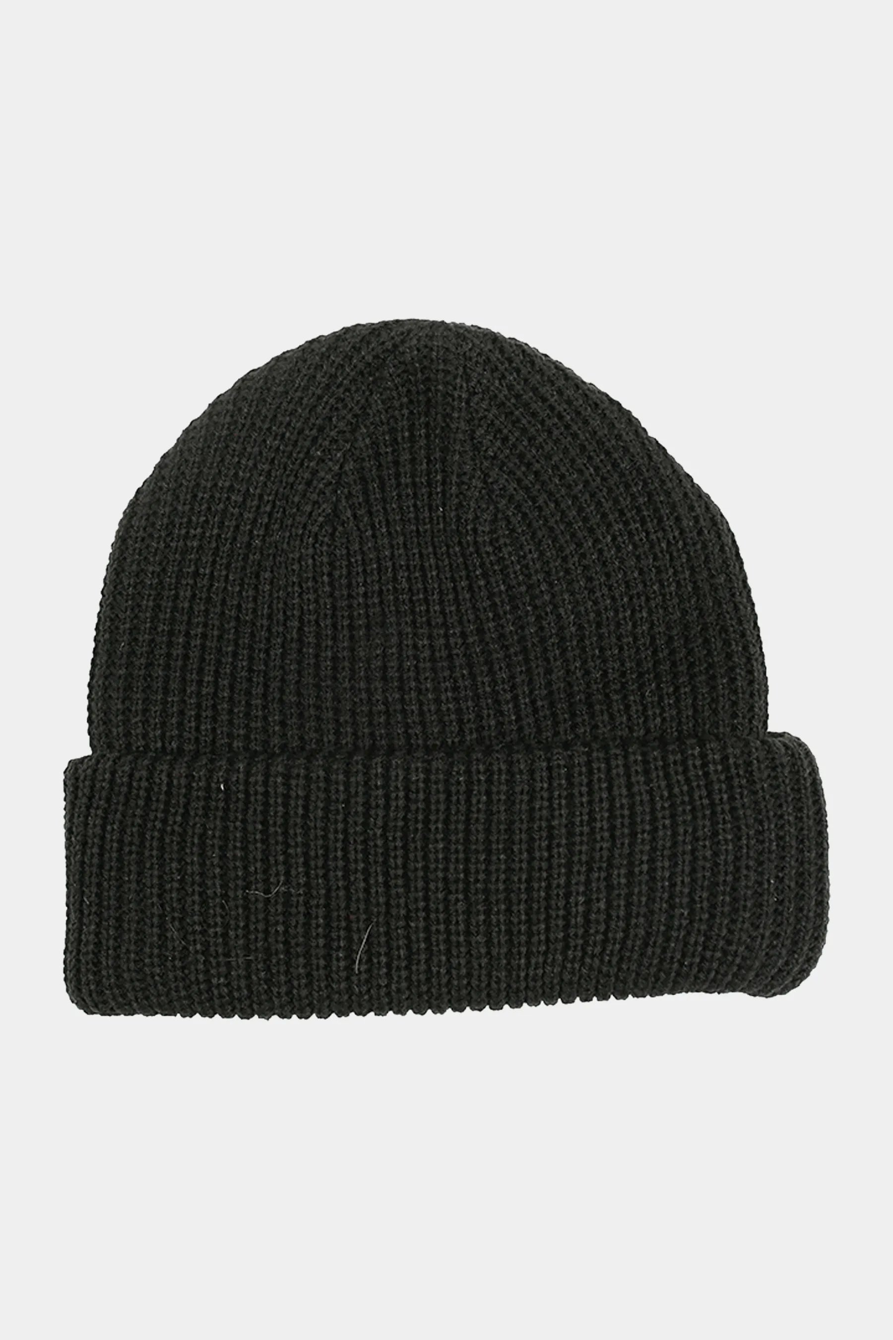 Black knit beanie on a light gray background — image 2