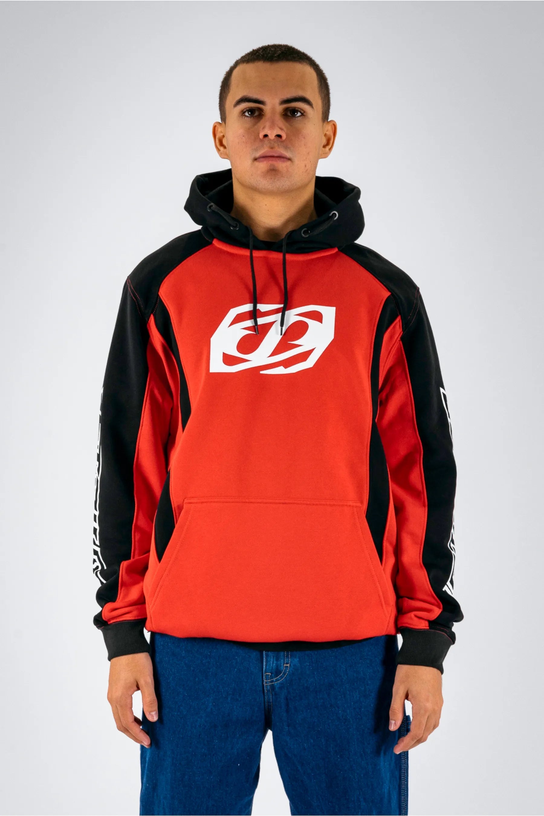 front view of a person wearing a black/red pullover with a white Jetpilot logo on a white background — view 1 (3)