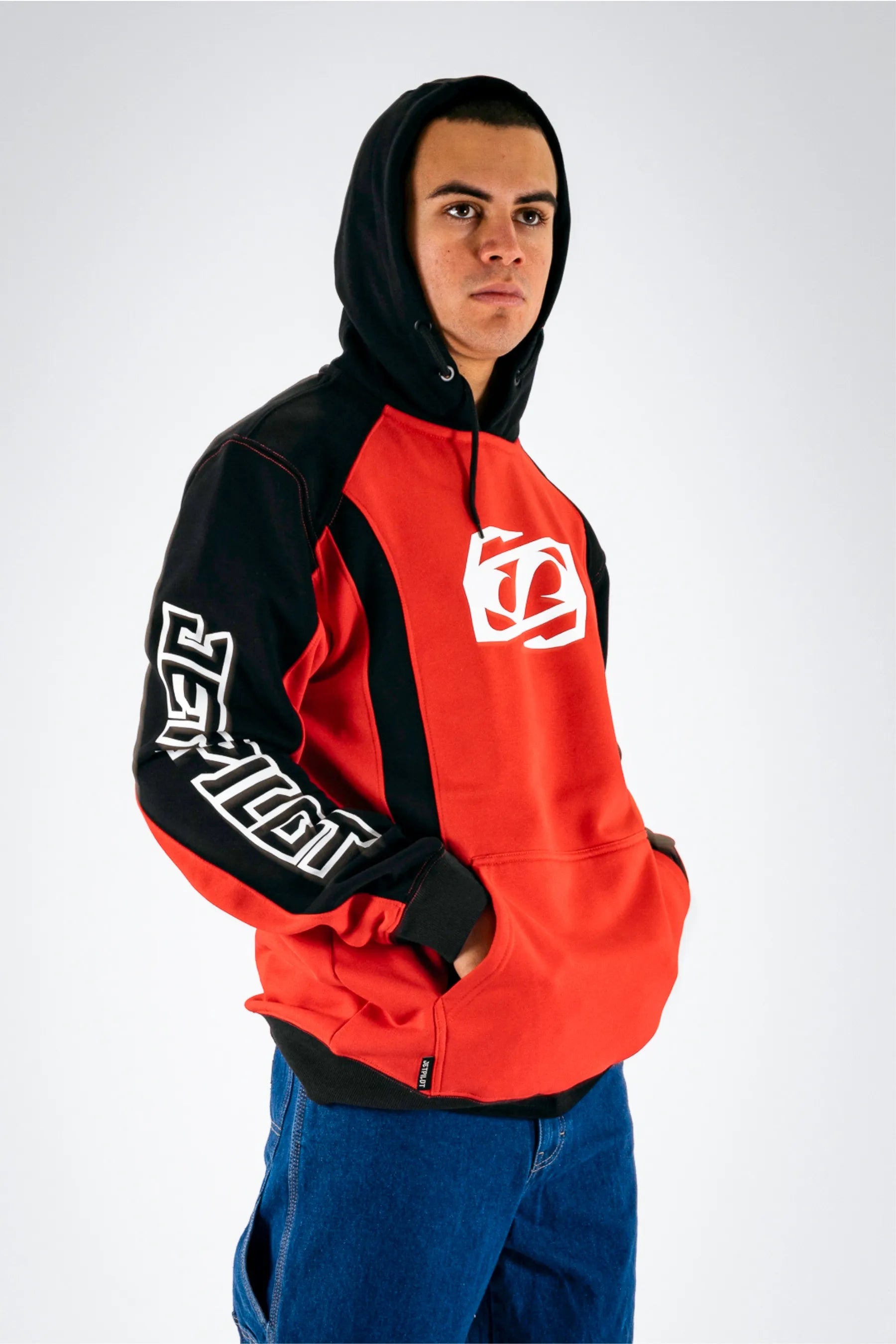 a person wearing a black/red with a white Jetpilot logo — view 4 (3)