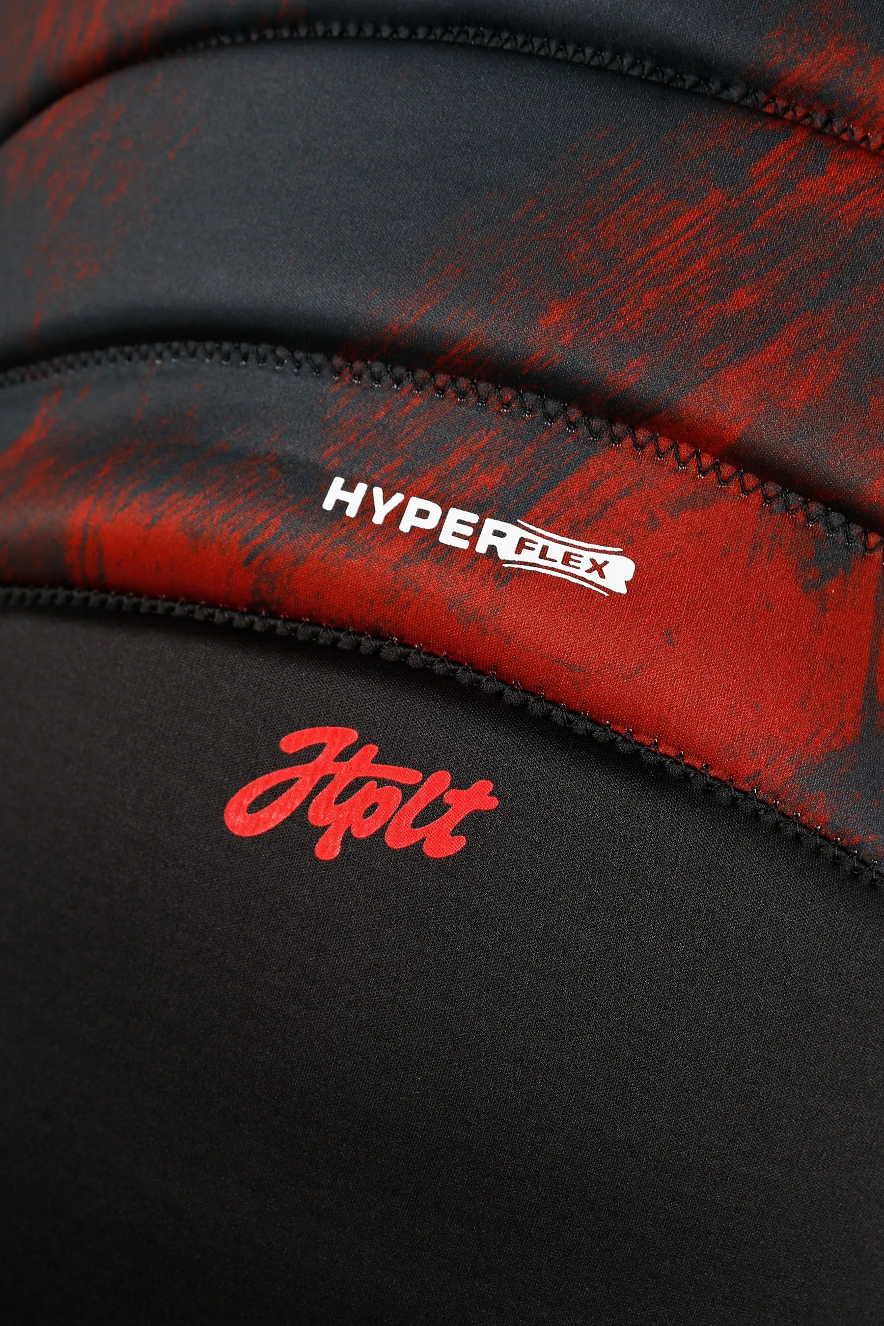 Close-up of a black and red life jacket with 'Hyperflex' branding.