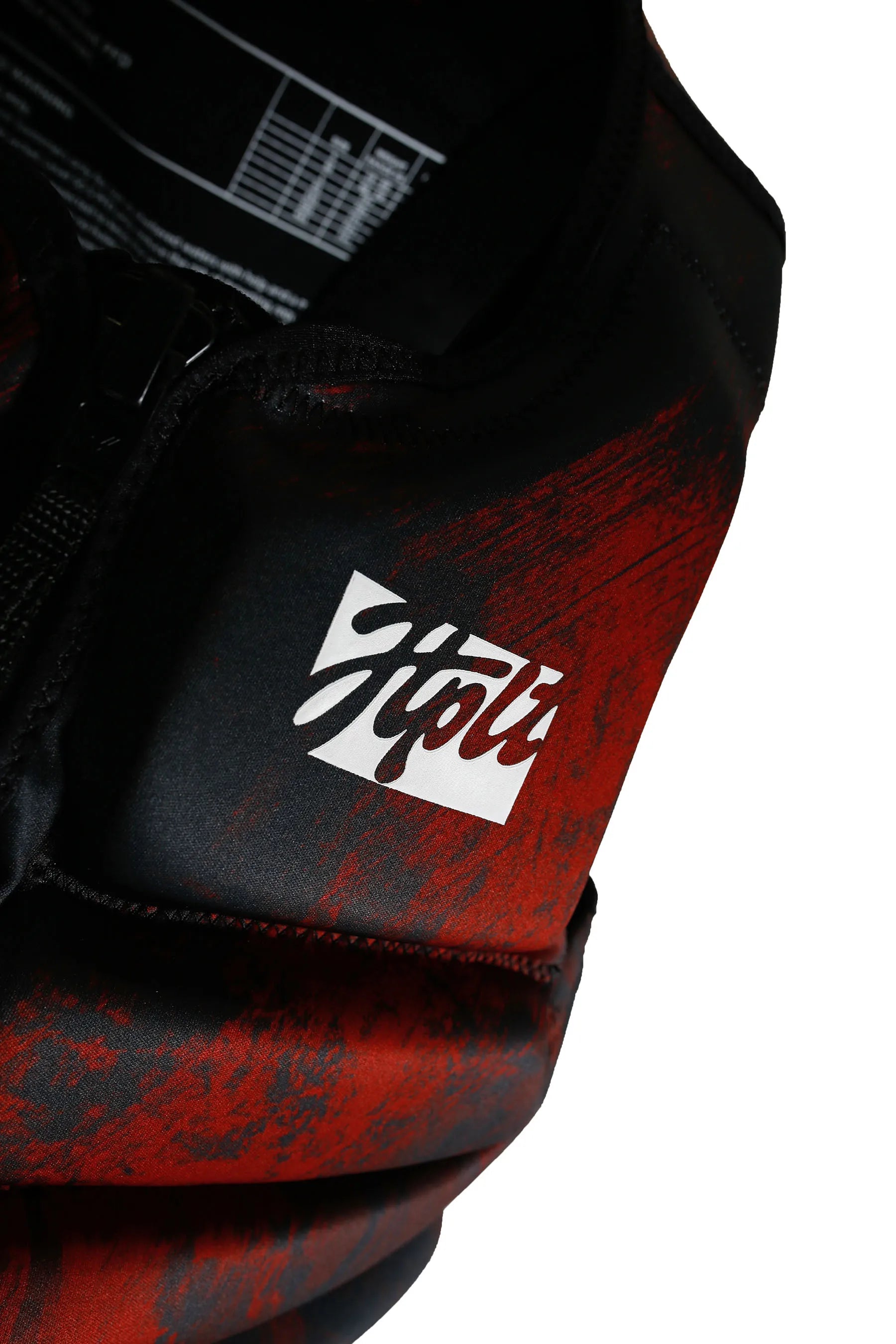 Close-up of a red and black Jetpilot Phase Hyperflex Life Jacket - Red with a visible brand logo on a white background