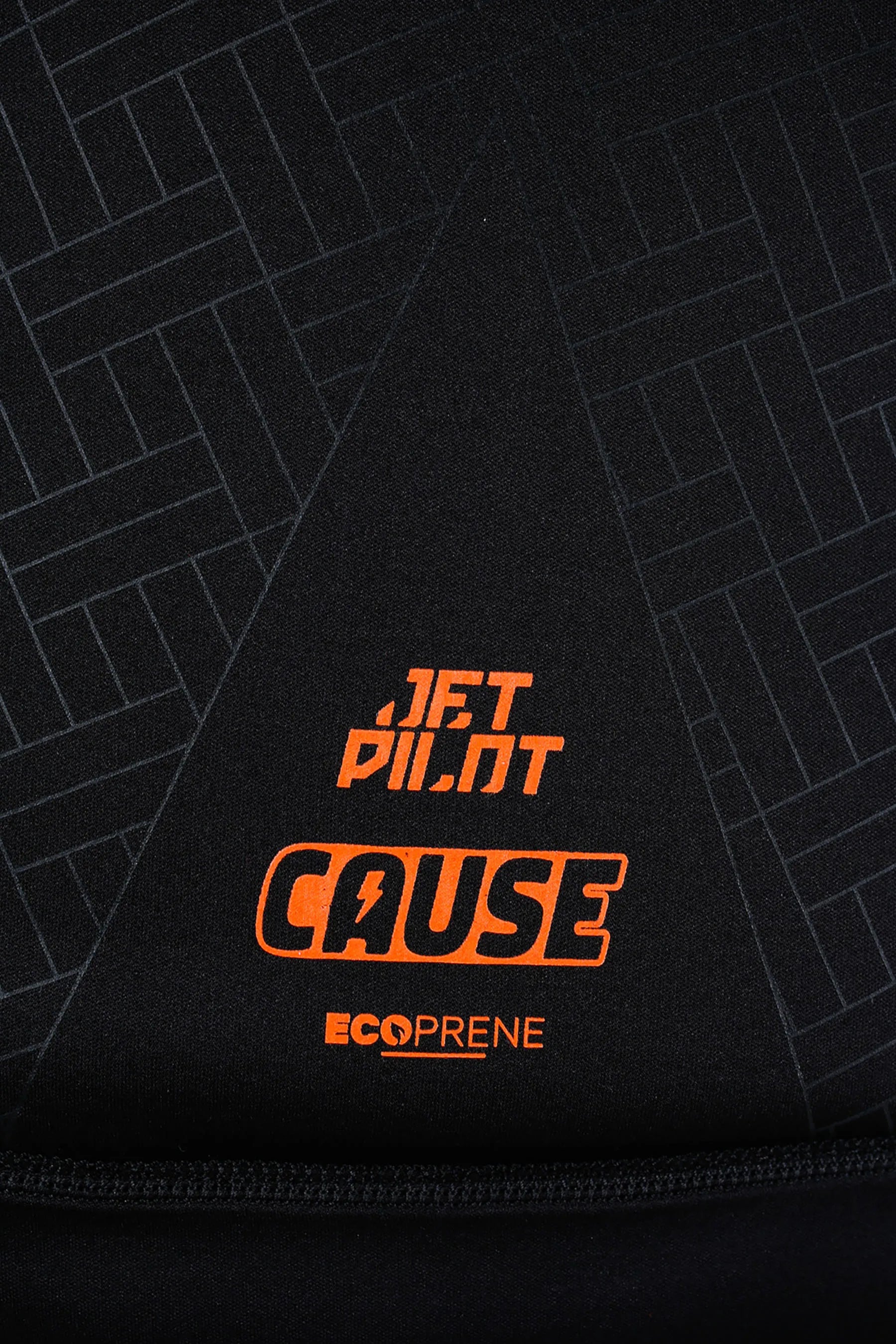 Jetpilot Cause Life Jacket - Orange/Black with  'JETPILOT CAUSE' and 'ECOPRENE' text on a geometric patterned background