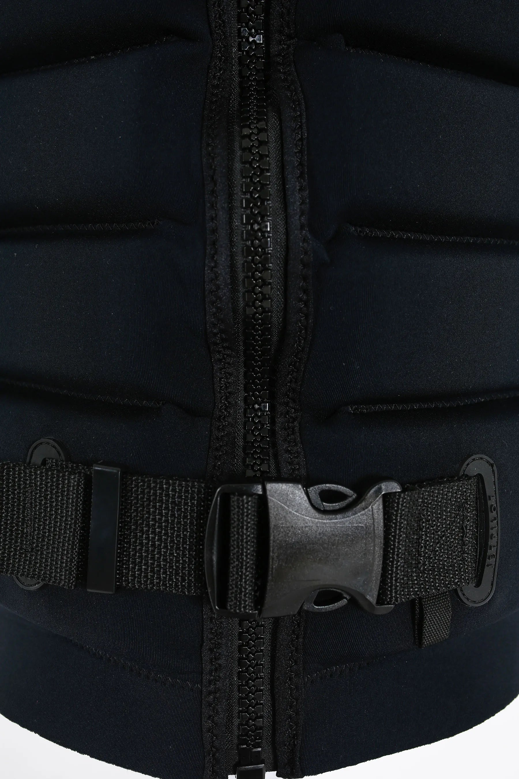 Close-up of a Jetpilot X1 Ladies Life Jacket - Zahra Kell Signature Series - Black with a zipper and buckle detail.