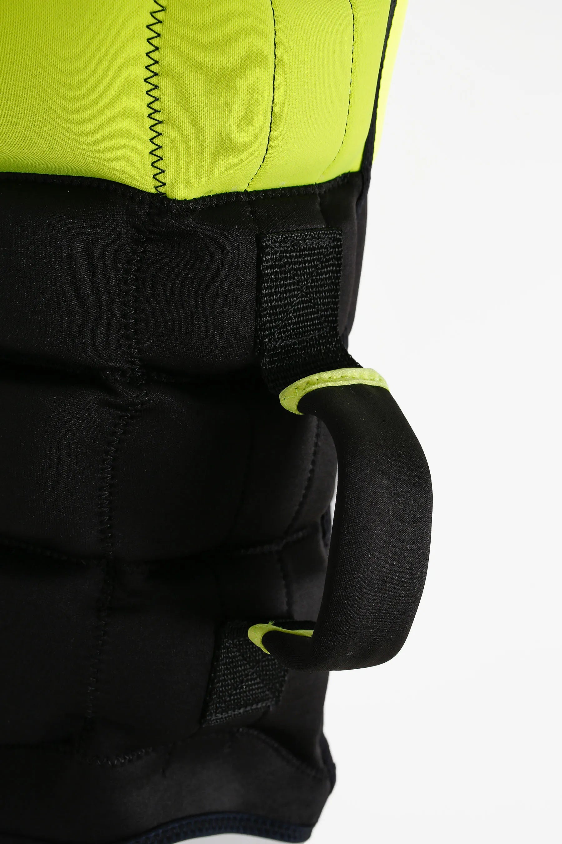 Close-up of a black and yellow ladies life jacket with a visible brand logo on a white background