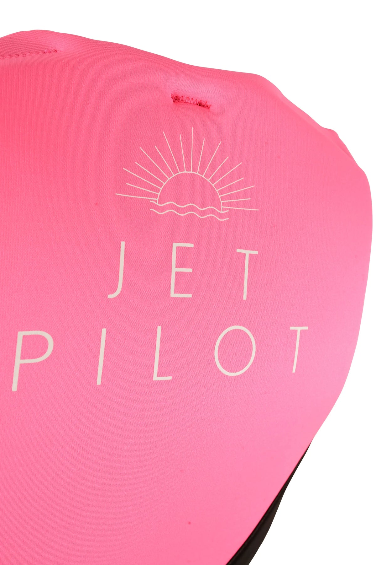 Close-up of the sunrise graphic and Jetpilot lettering on the upper back of the Pink Cause Ladies