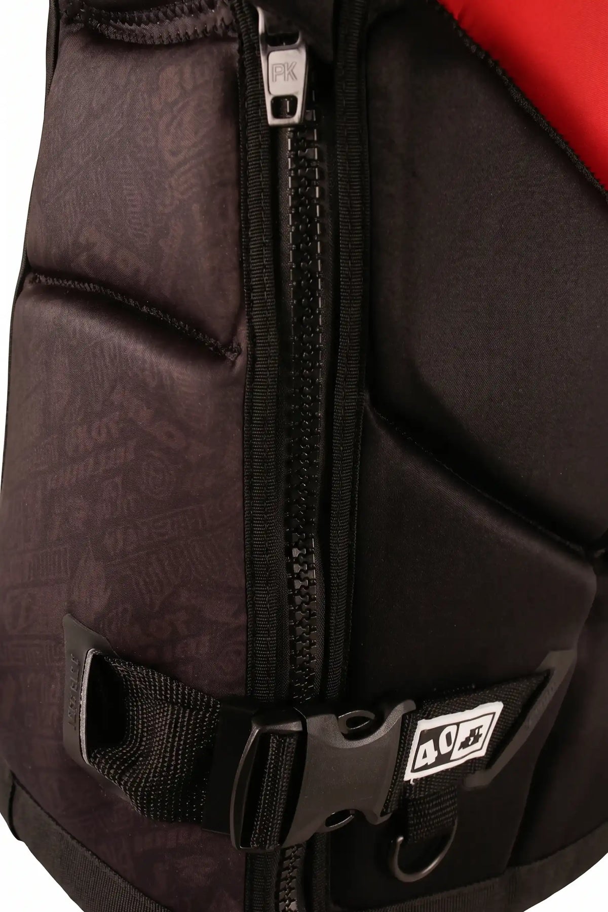 Close-up of the side zip, belt buckle with 40 tab and D-ring on the Red 40 Year Nighthawk