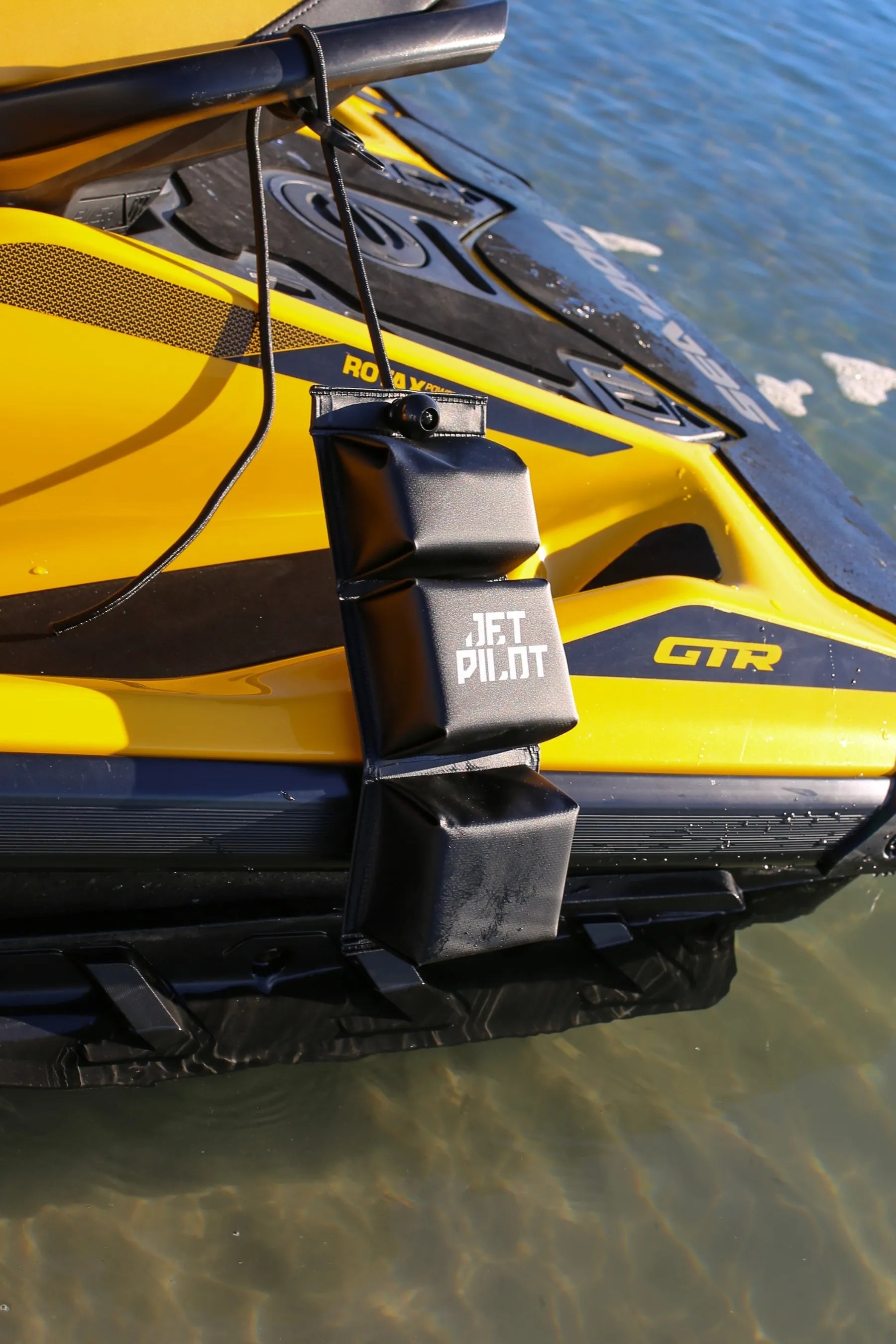 Close-up of a yellow and black watercraft with 'Jetpilot' fender on water . — view 5 (3)