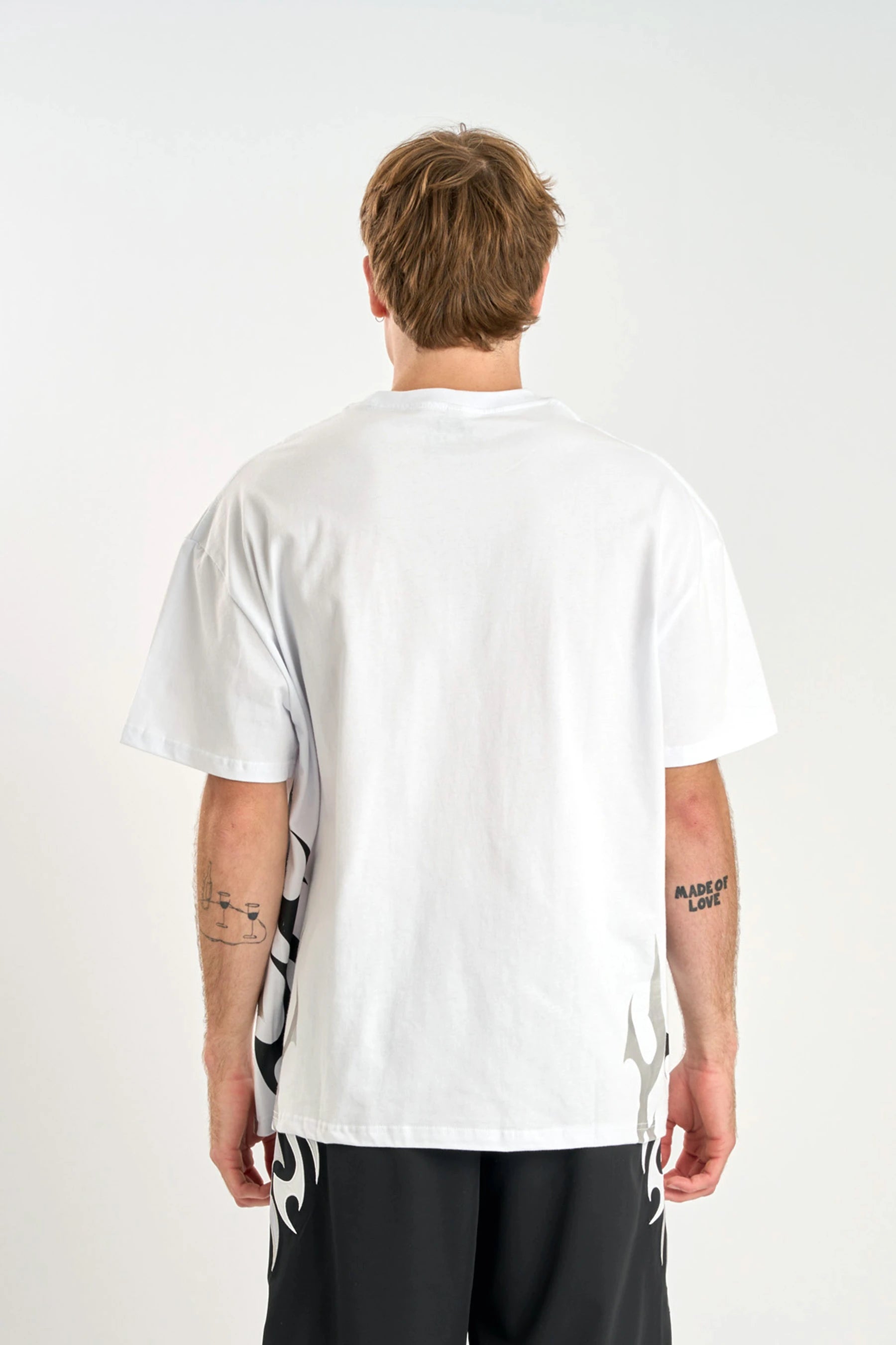 Back view wearing a Jetpilot Tribal Heavy Tee - White, standing against a plain background. — image 2