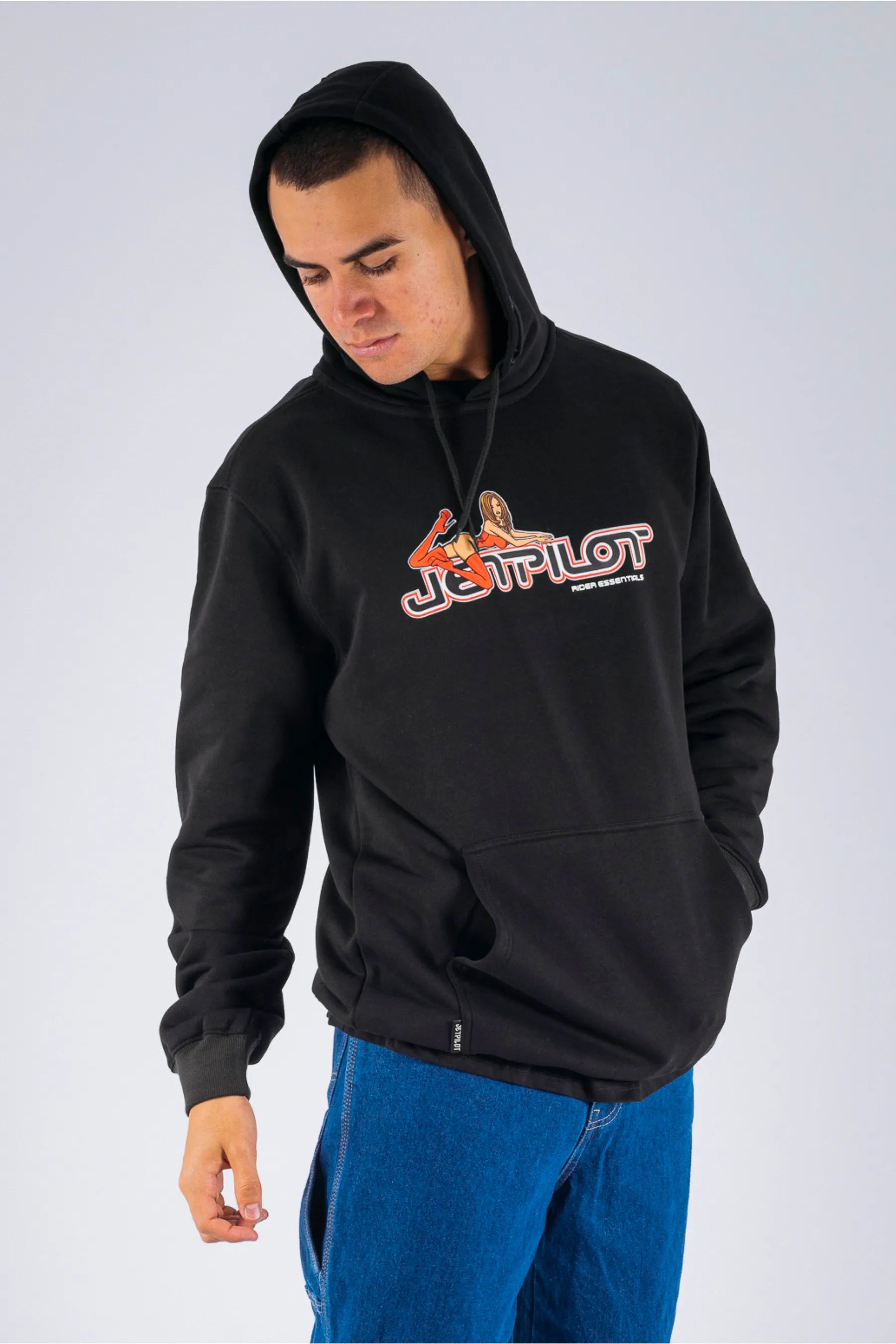 a person wearing a black pullover with a Jetpilot logo — view 5 (5)