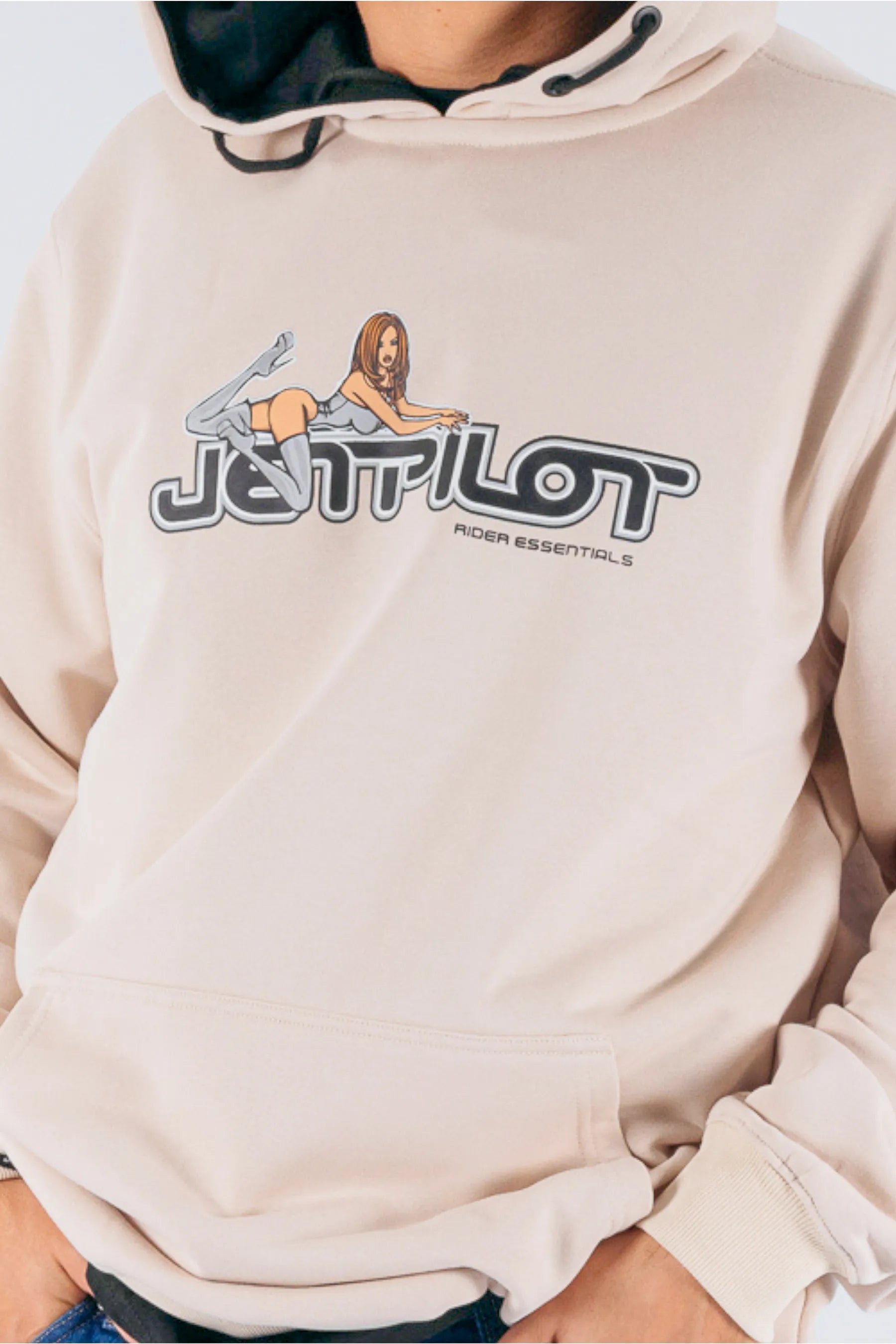 close up of a person wearing a cement pullover with a Jetpilot logo on a white background — view 5 (3)
