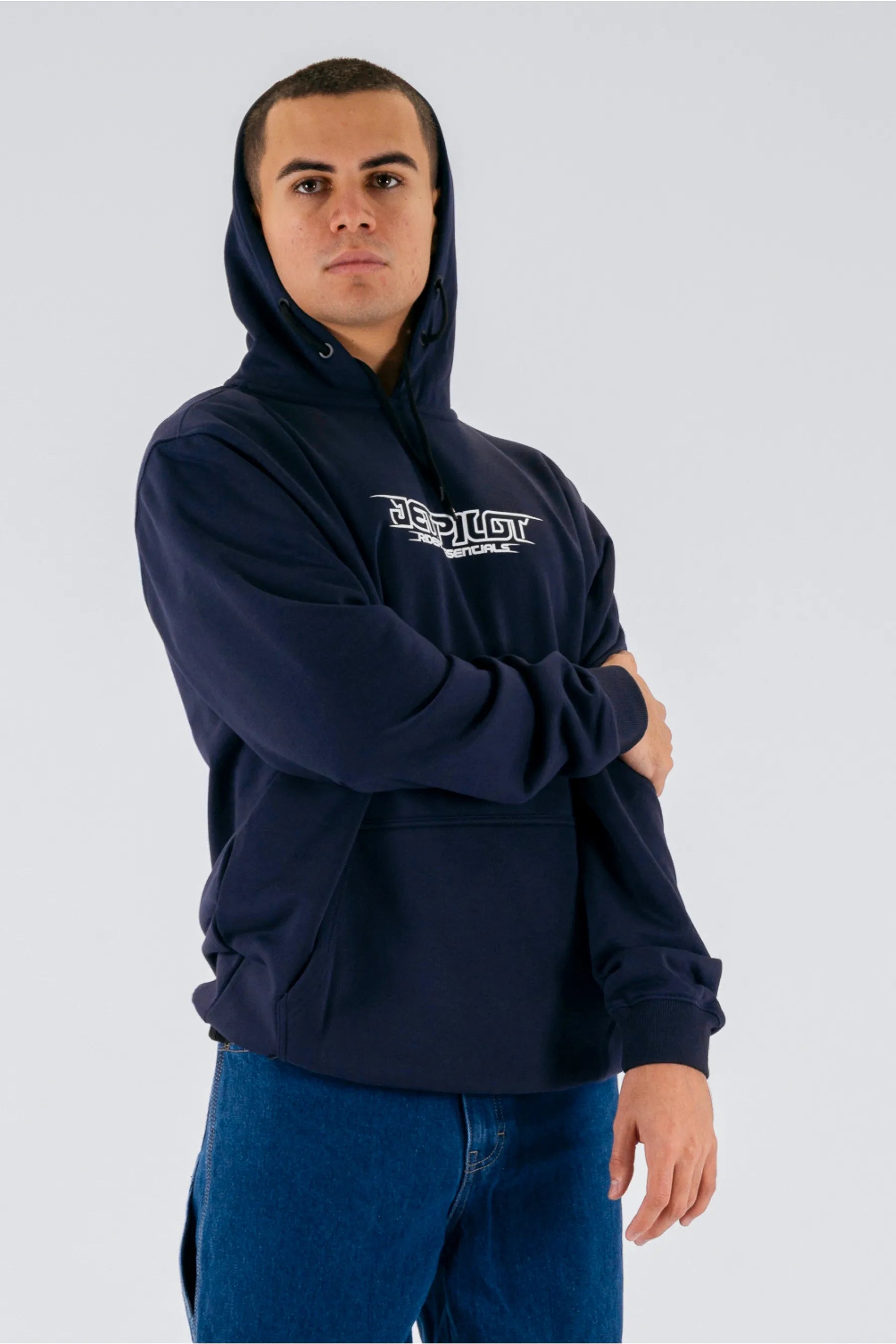 a person wearing a dark blue pullover with a Jetpilot logo on a white background — view 4 (3)