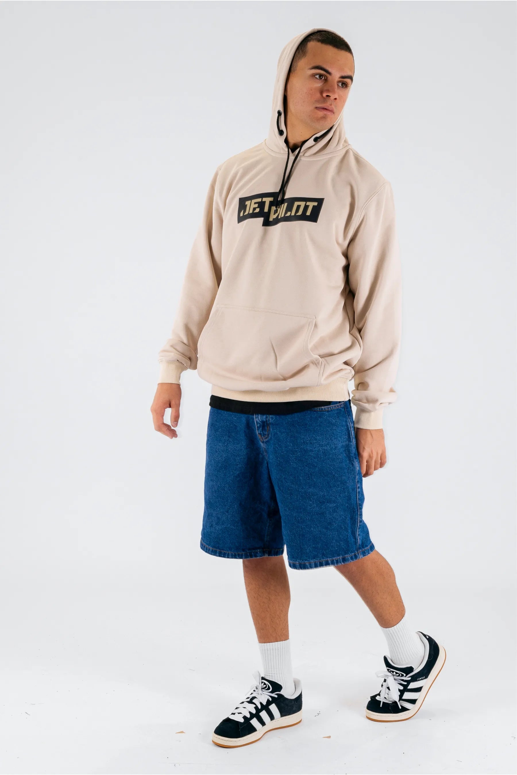 Front view of a person wearing the hood of a cement pullover with a Jetpilot logo on a white background — view 4 (3)