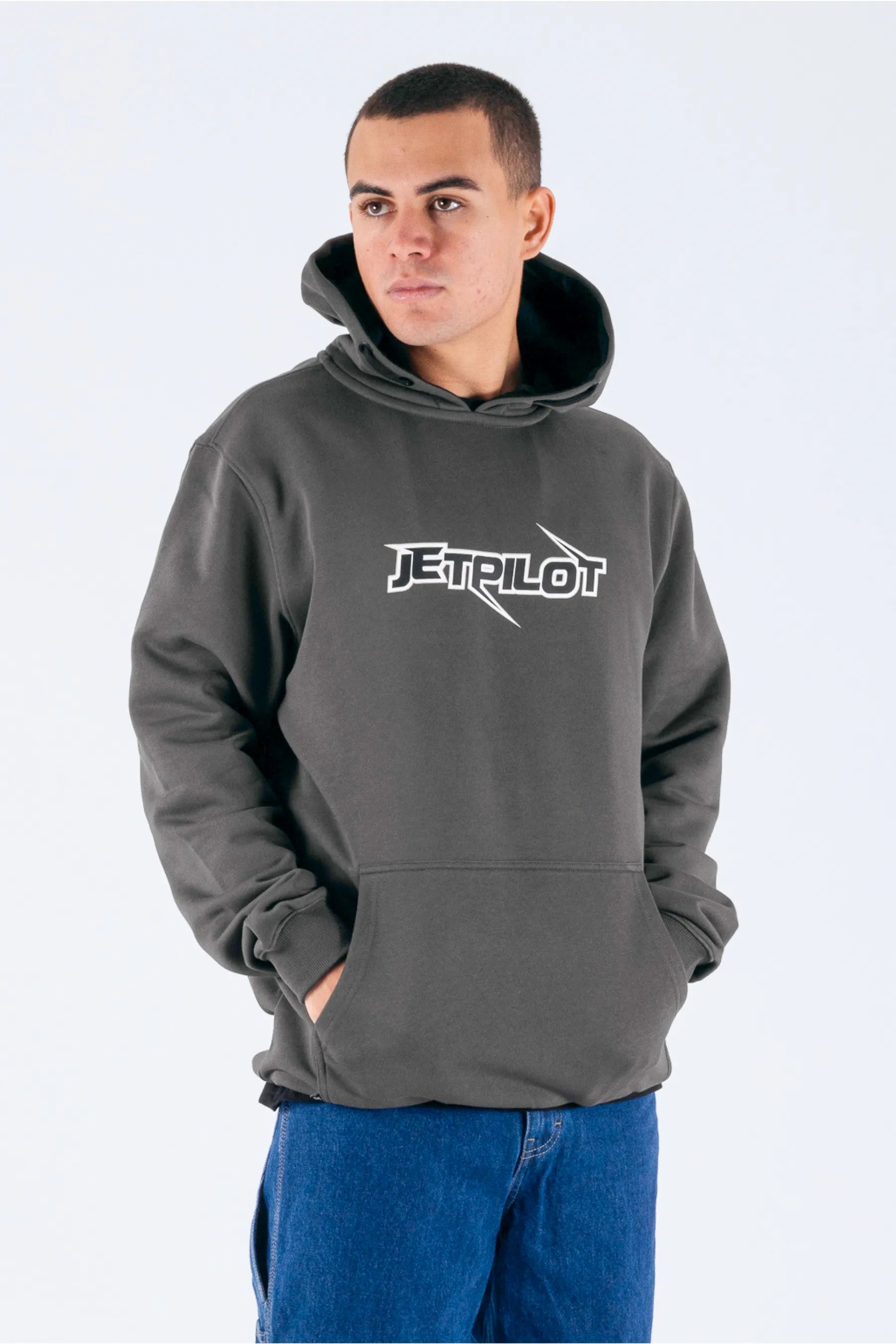 a person wearing a charcoal pullover with a Jetpilot logo — view 3 (5)