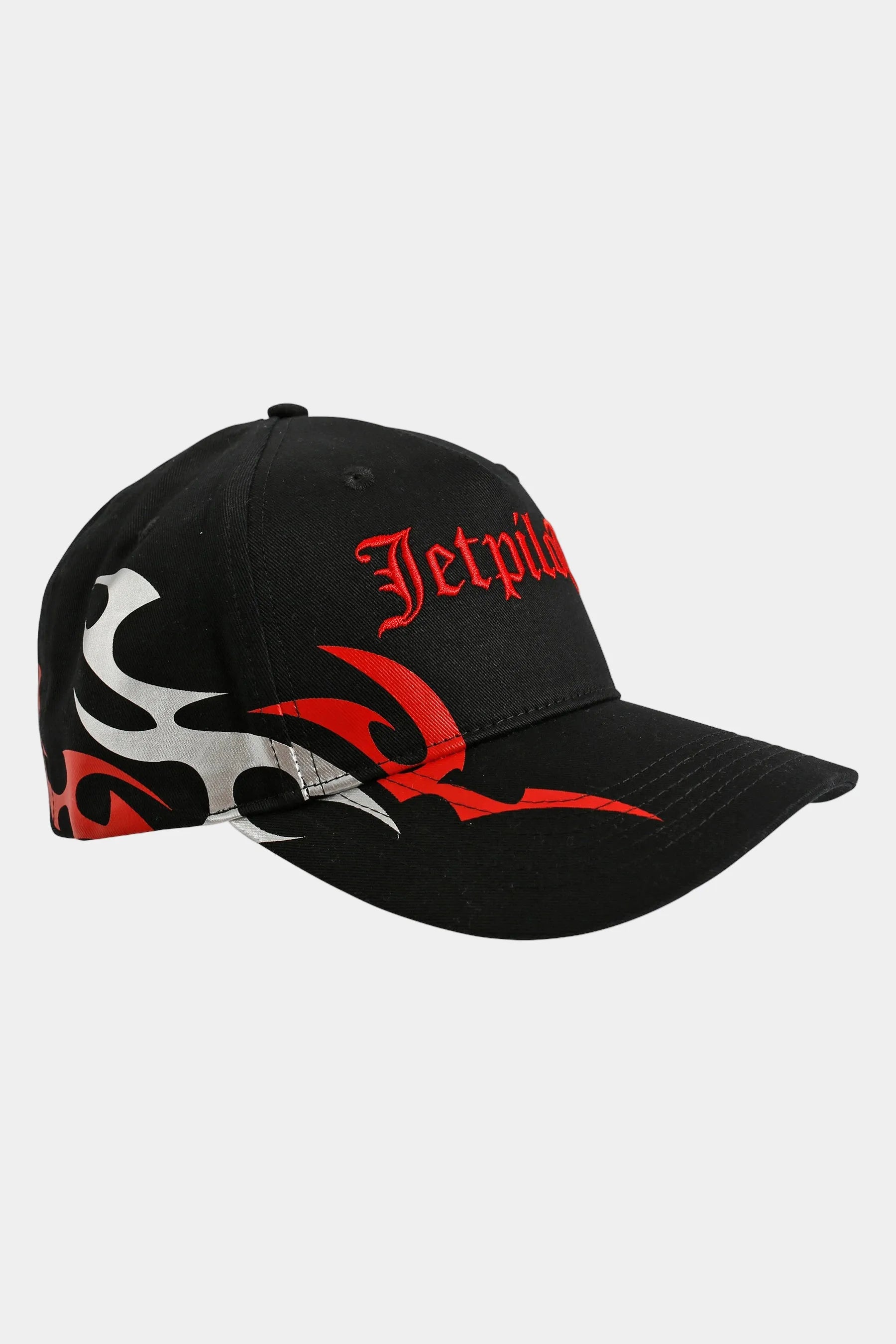 Black cap with red and metallic grey designs on a light grey background