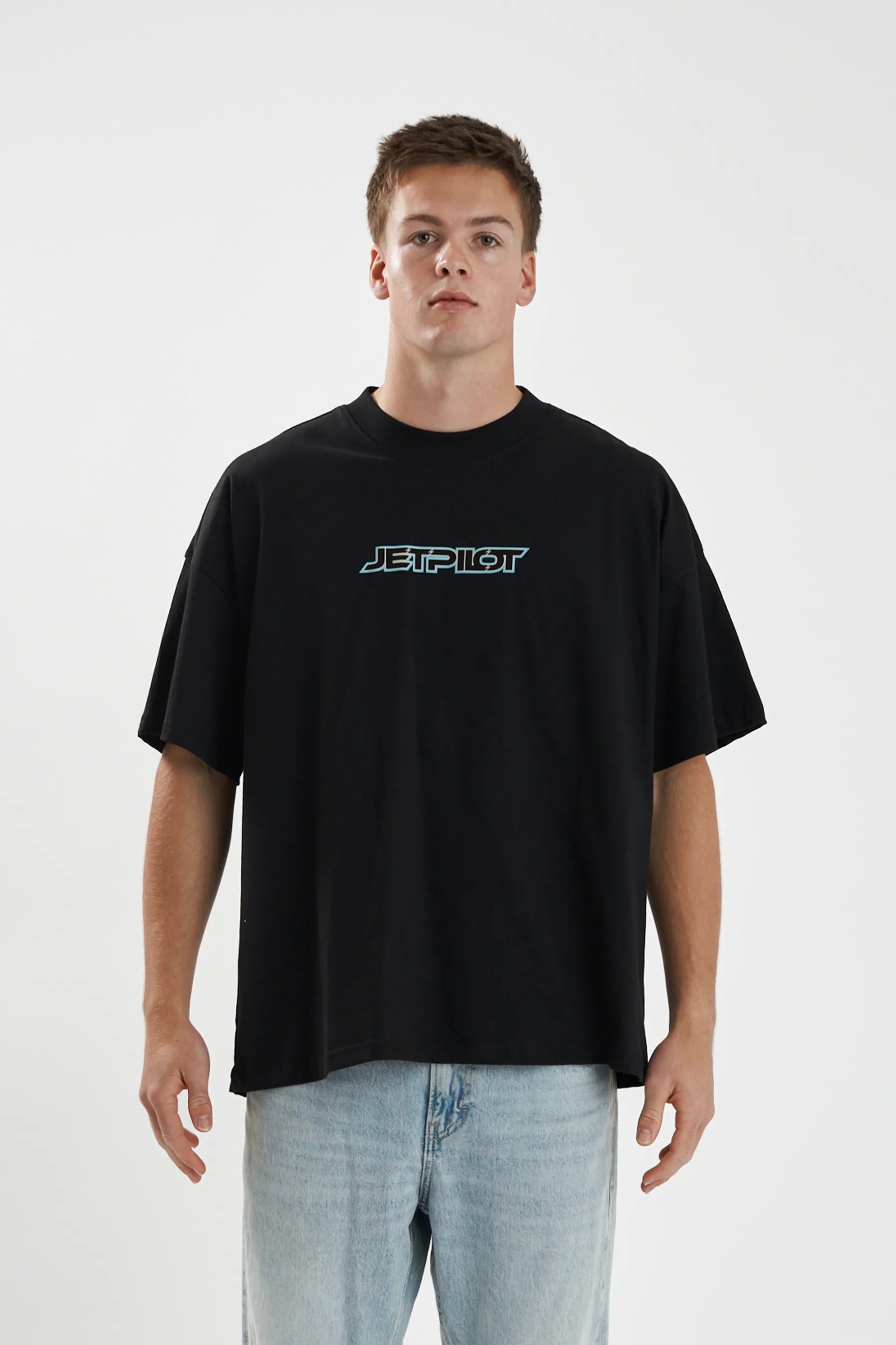 Jetpilot Stocked Up Spinal mens oversized graphic tee in Black — front view on a male model
