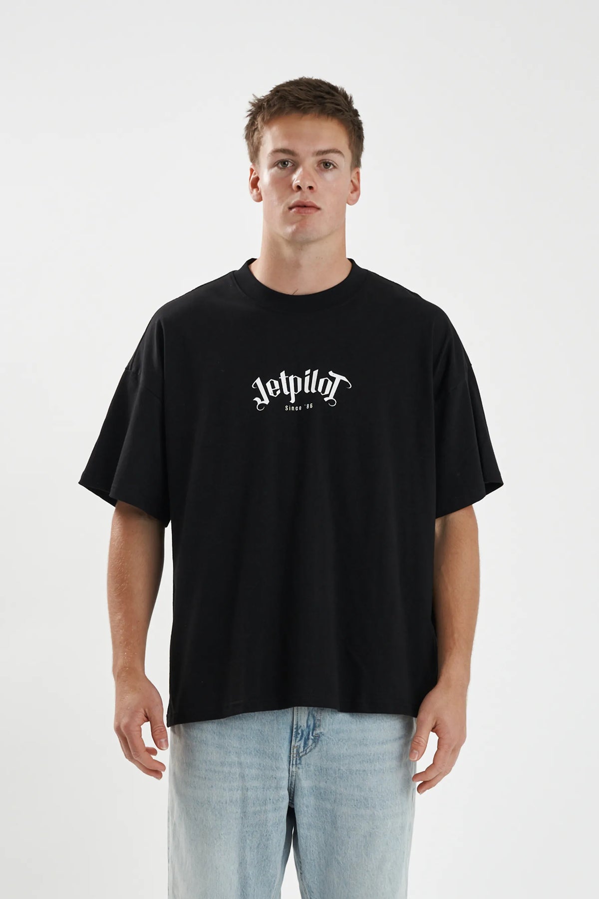 Jetpilot Plastered mens oversized graphic tee in Black — front view on a male model