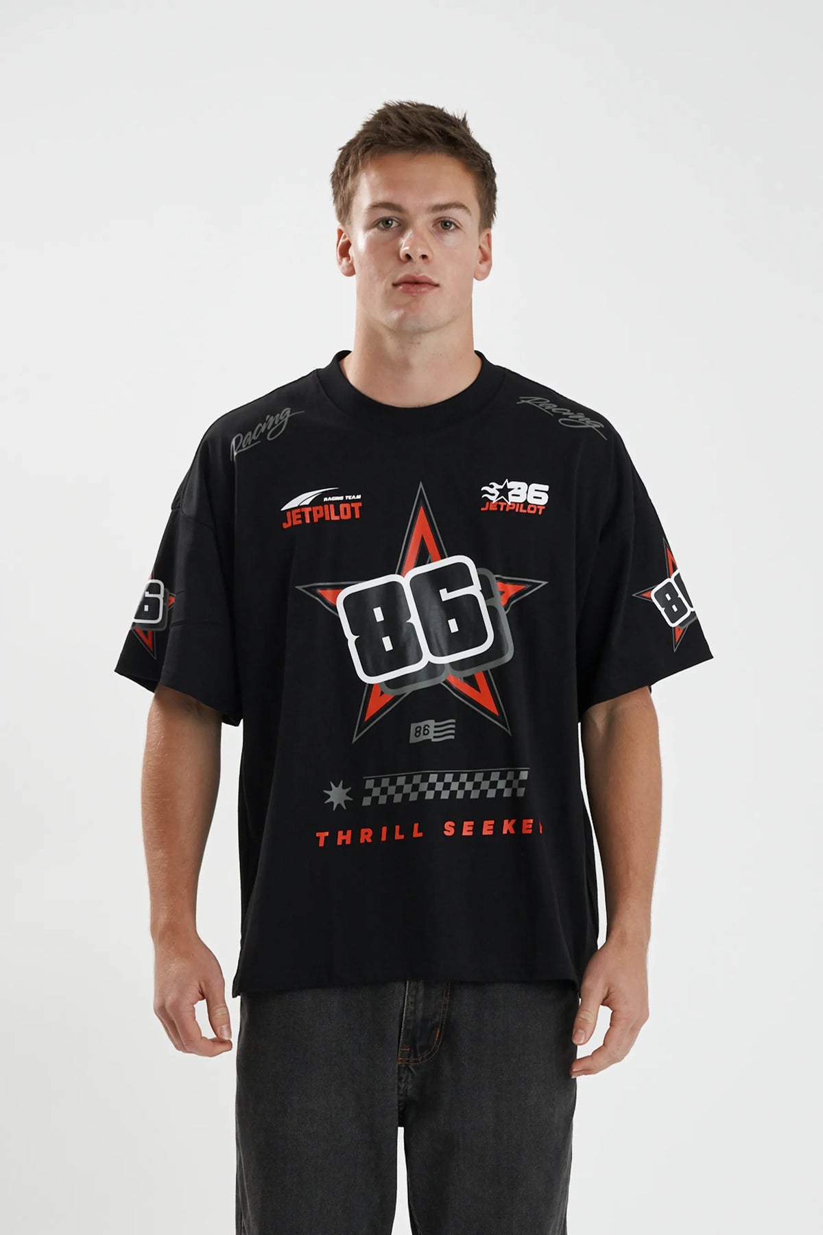 Jetpilot Race Fan mens oversized graphic tee in Black/Red — front view on a male model