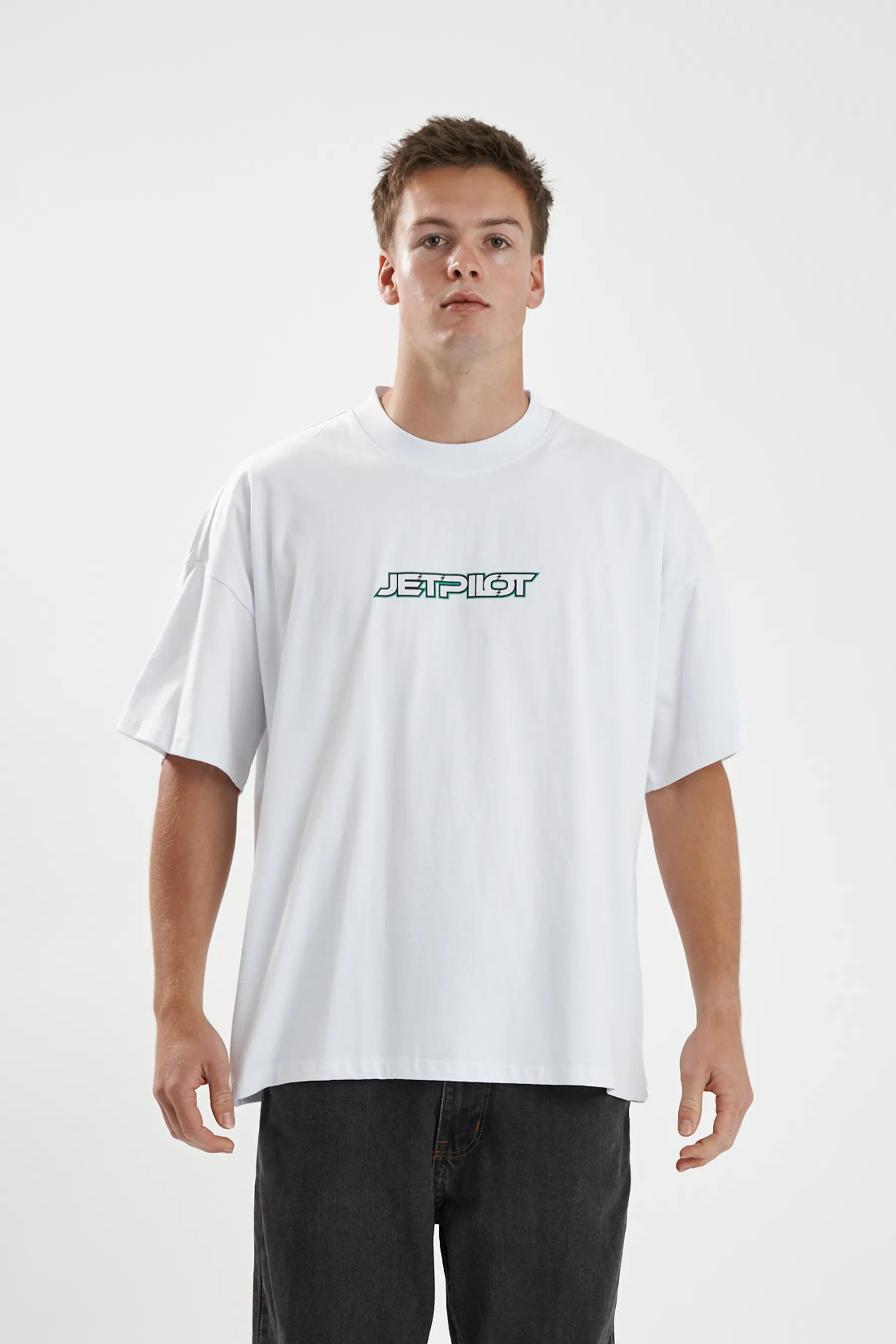Jetpilot Stocked Up mens oversized graphic tee in White — front view on a male model
