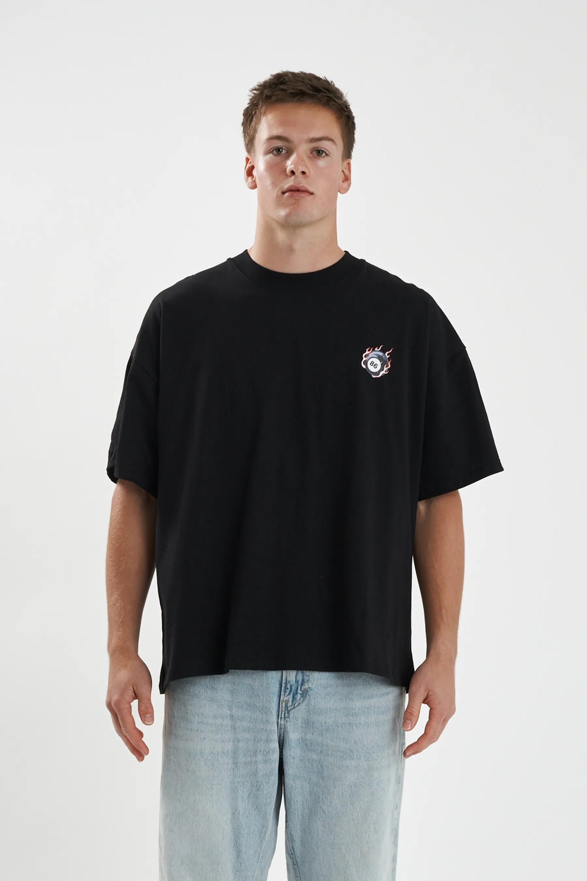 Jetpilot Baller mens oversized graphic tee in Black — front view on a male model