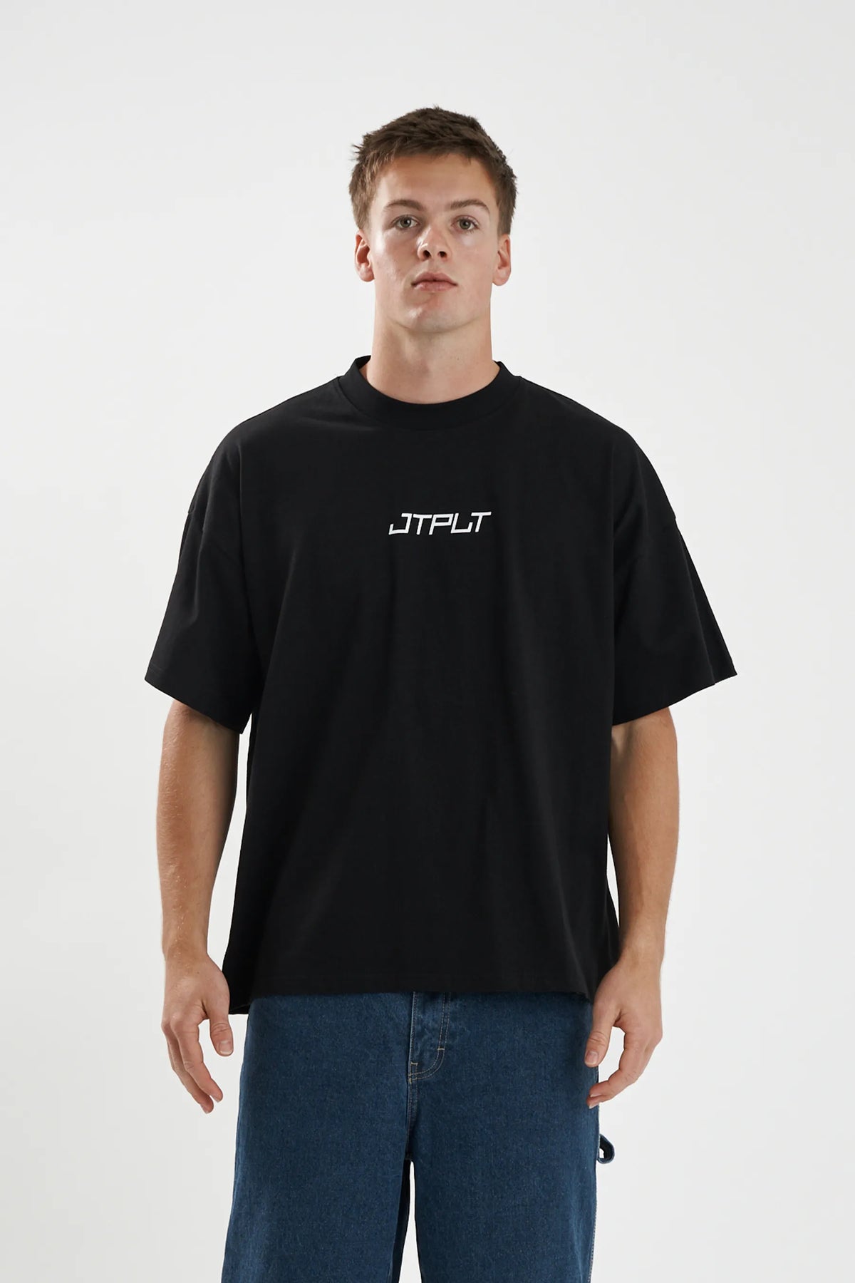 Jetpilot Vault Core mens oversized graphic tee in Black — front view on a male model