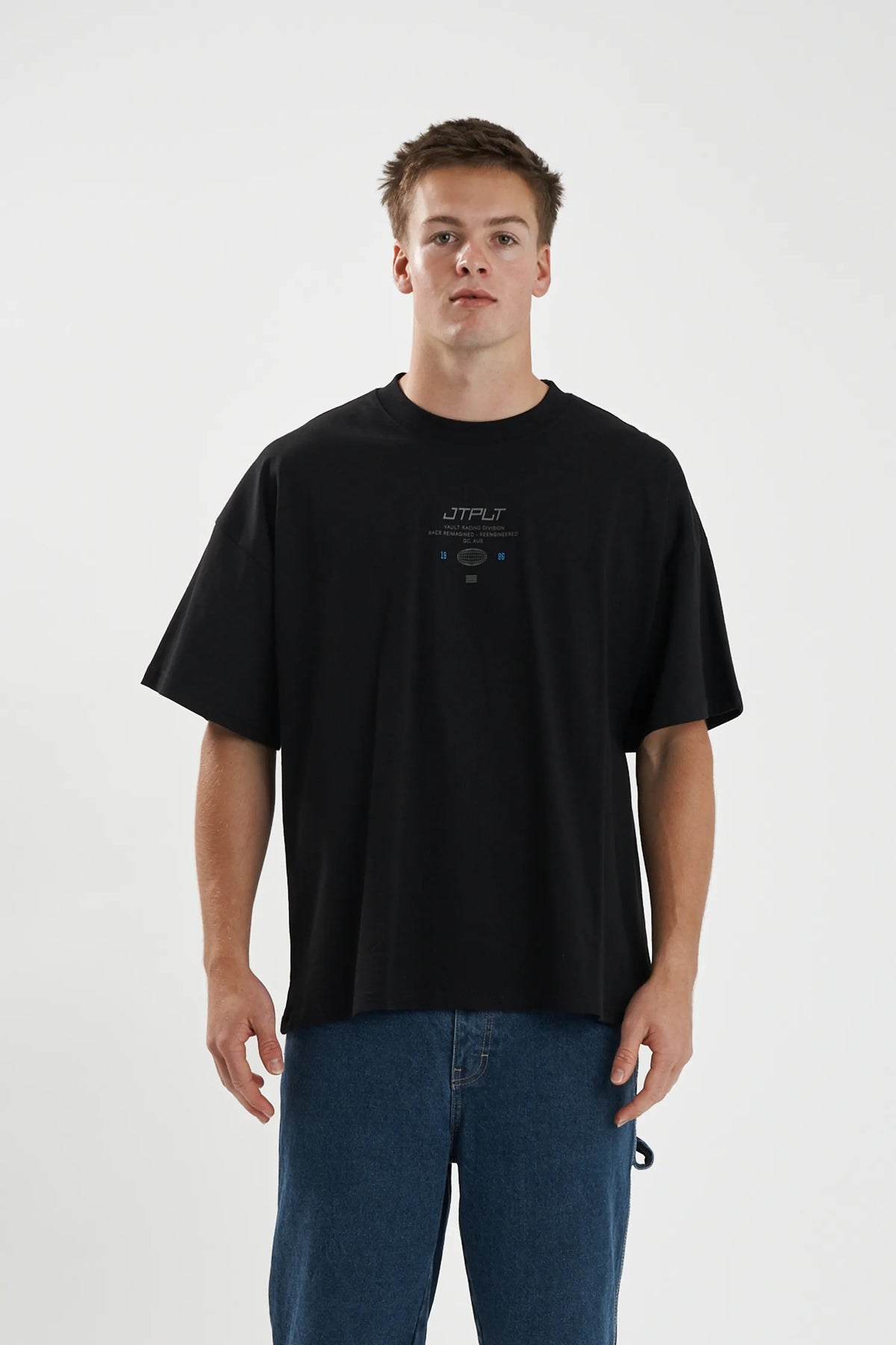 Jetpilot Vault Tech mens oversized graphic tee in Black — front view on a male model