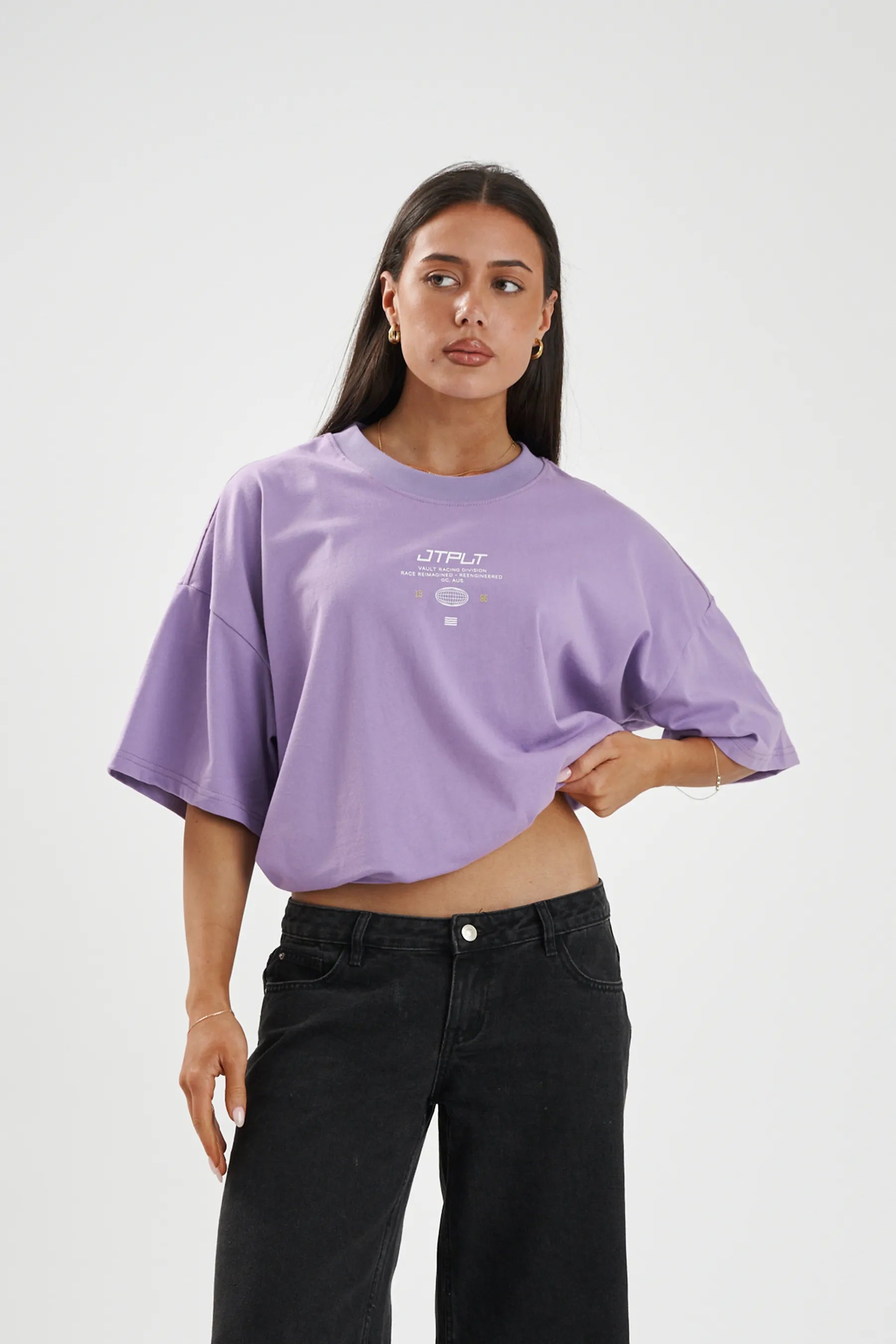 Jetpilot Vault Tech mens oversized graphic tee in Purple — front view on a female model