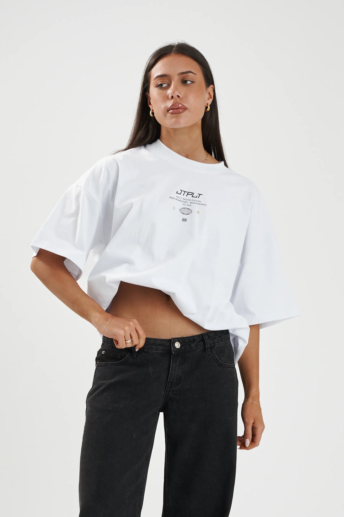 Jetpilot Vault Tech mens oversized graphic tee in White — front view on a female model