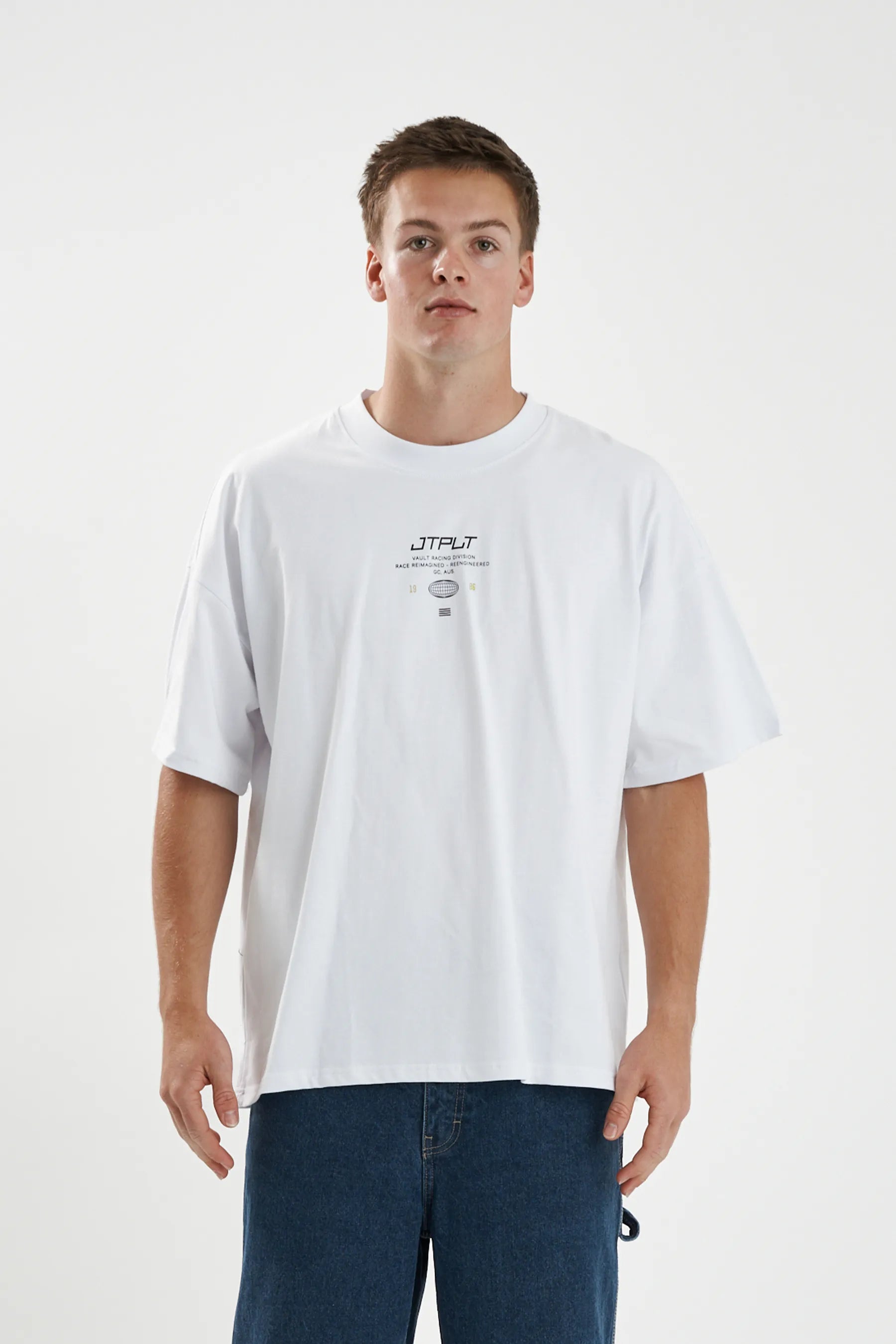 Jetpilot Vault Tech mens oversized graphic tee in White — front view on a male model