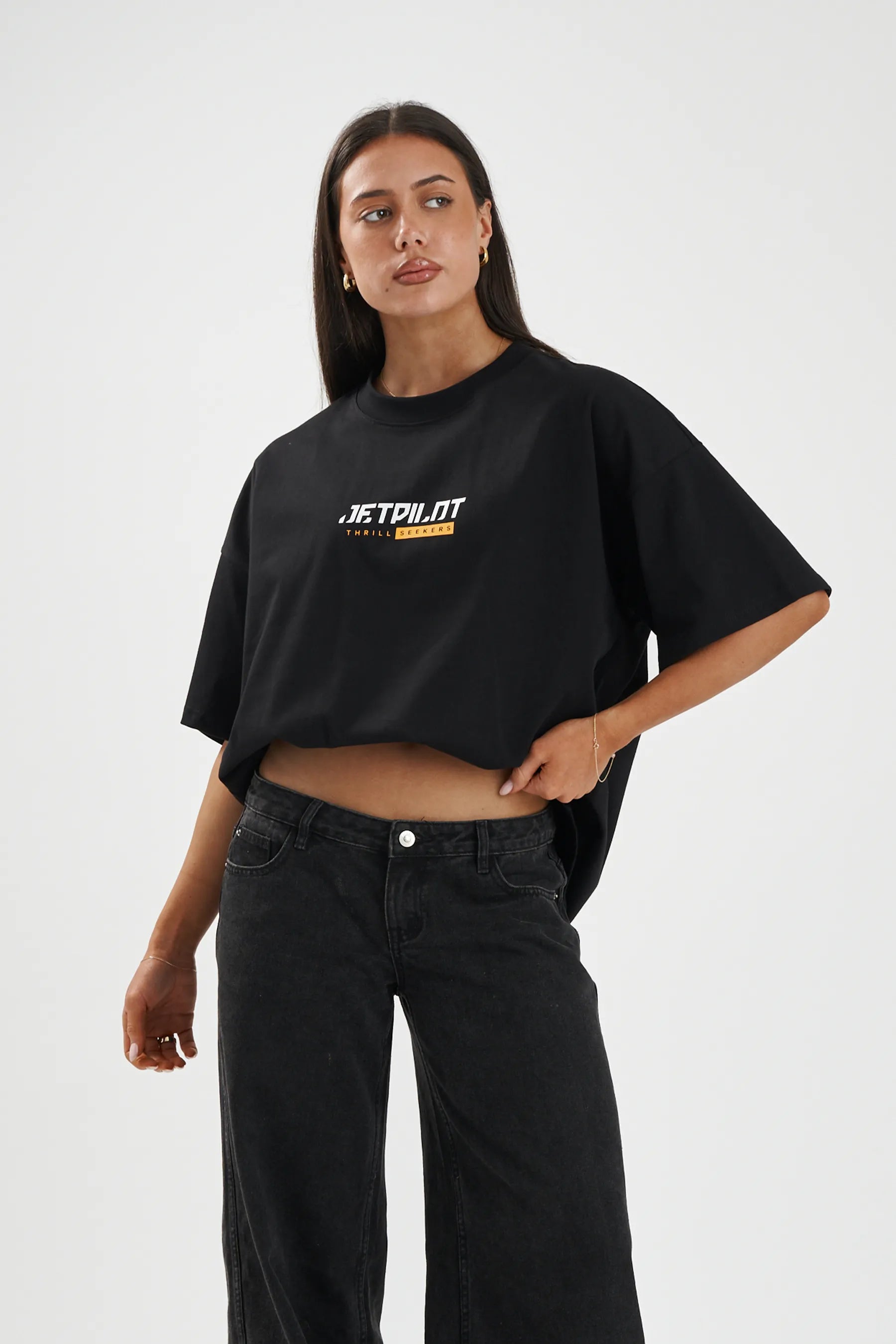 Jetpilot 86 Worldwide mens oversized graphic tee in Black — front view on a female model