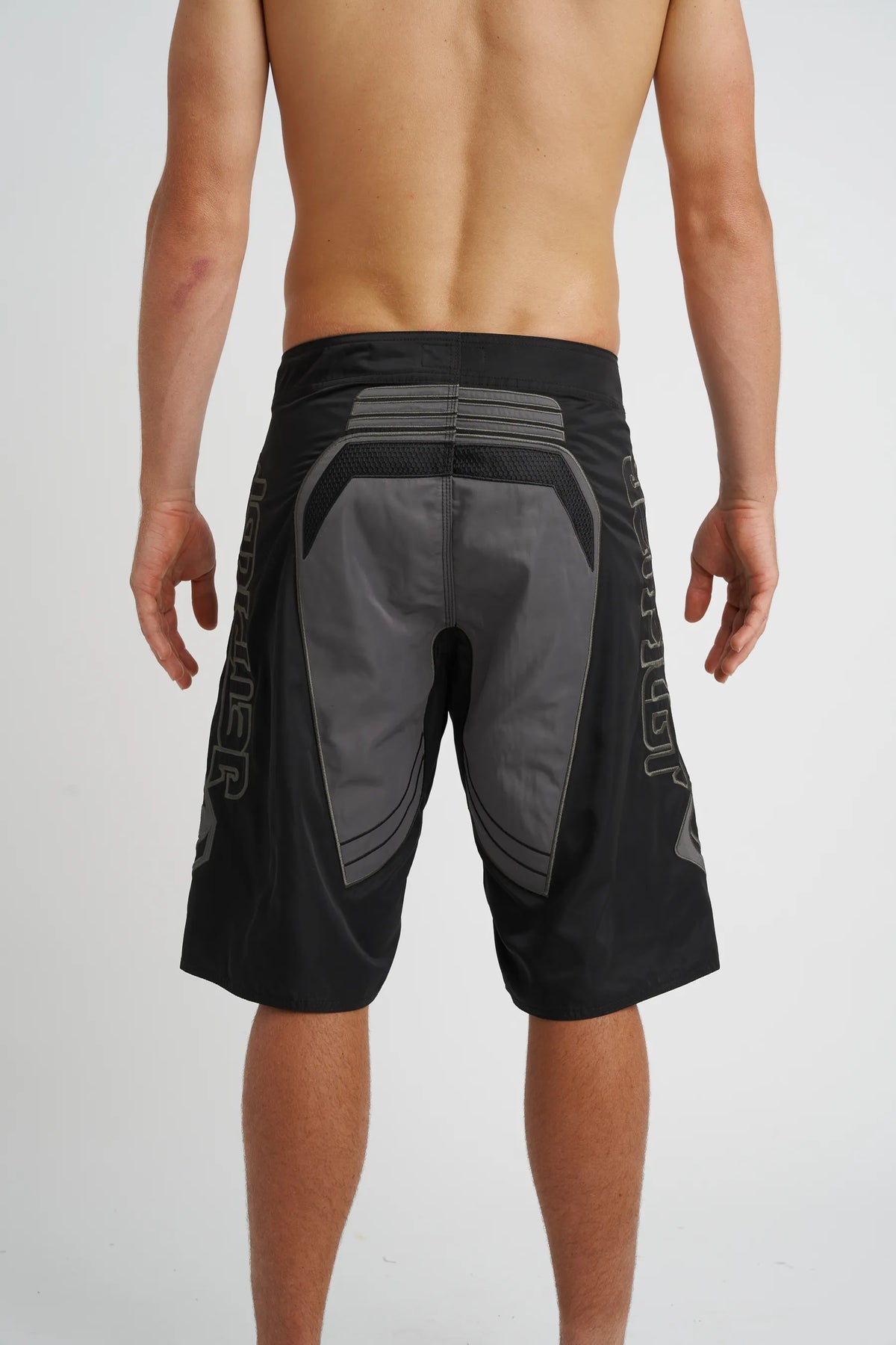 Jetpilot Vintage Moto mens board shorts in Black — back view