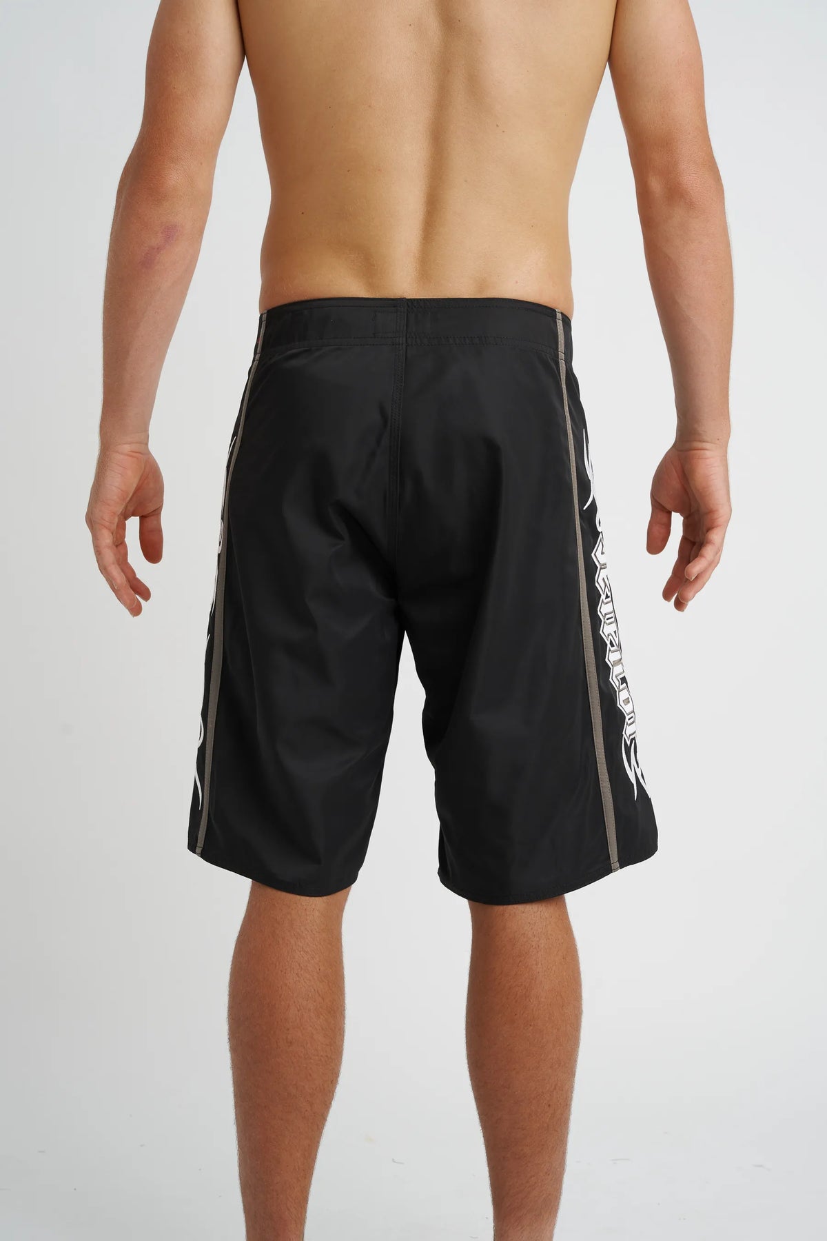Jetpilot Tribalism mens board shorts in Black — back view