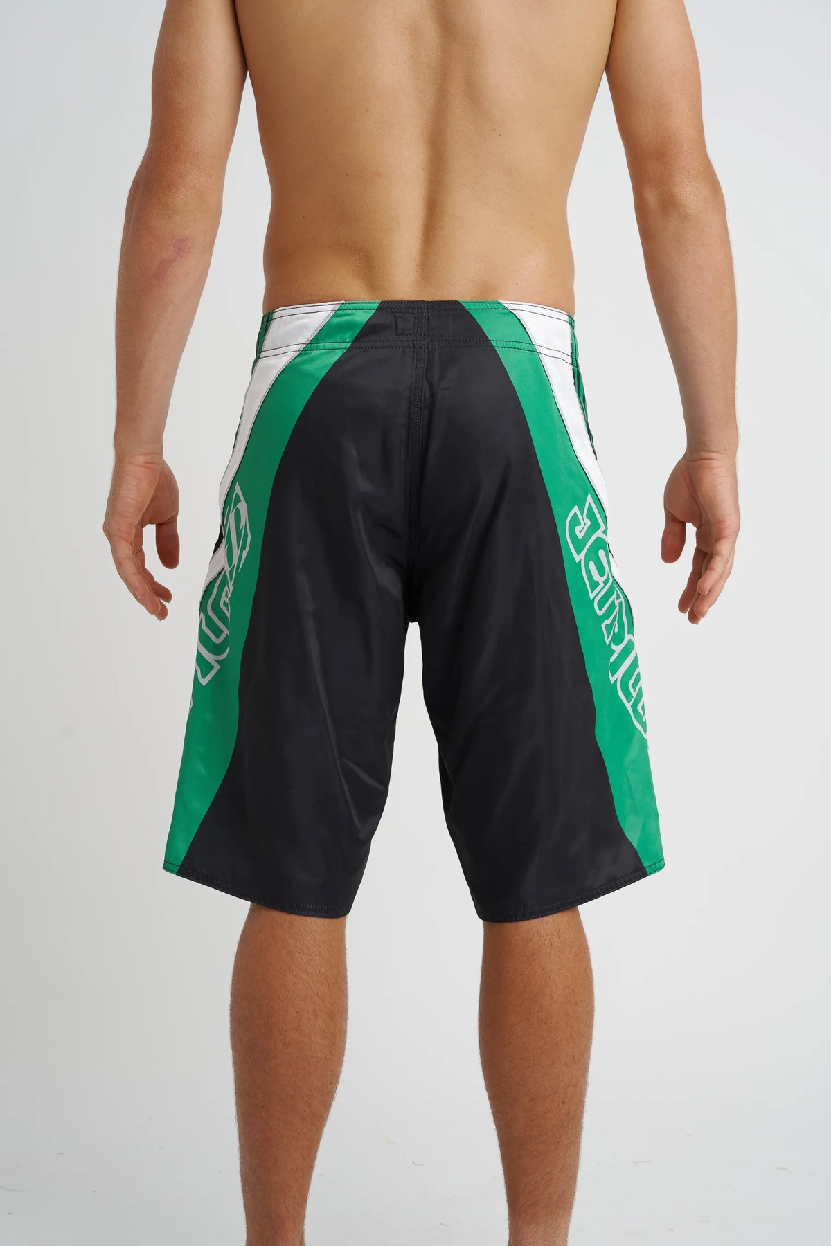 Jetpilot Alloy mens board shorts in Green — back view