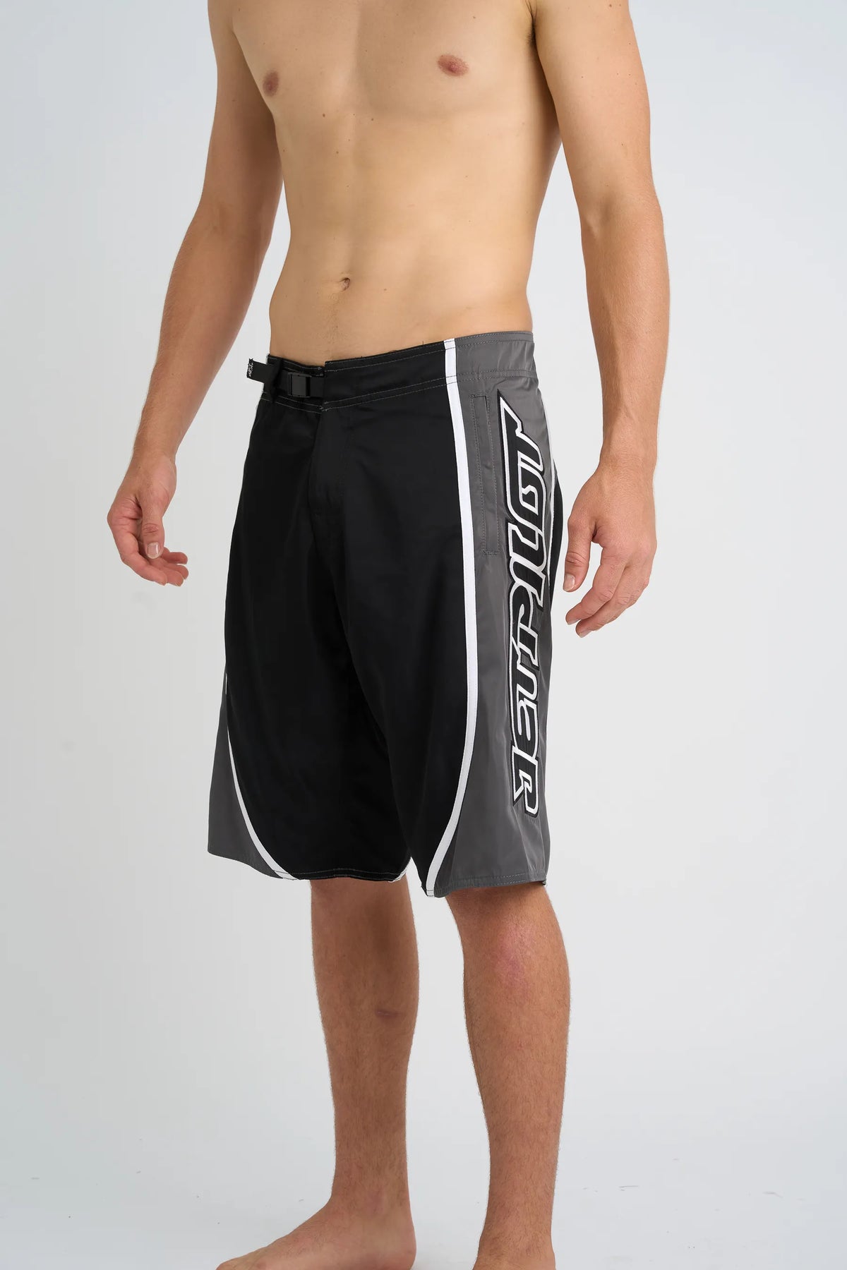 Jetpilot Impact mens board shorts in Black — side view